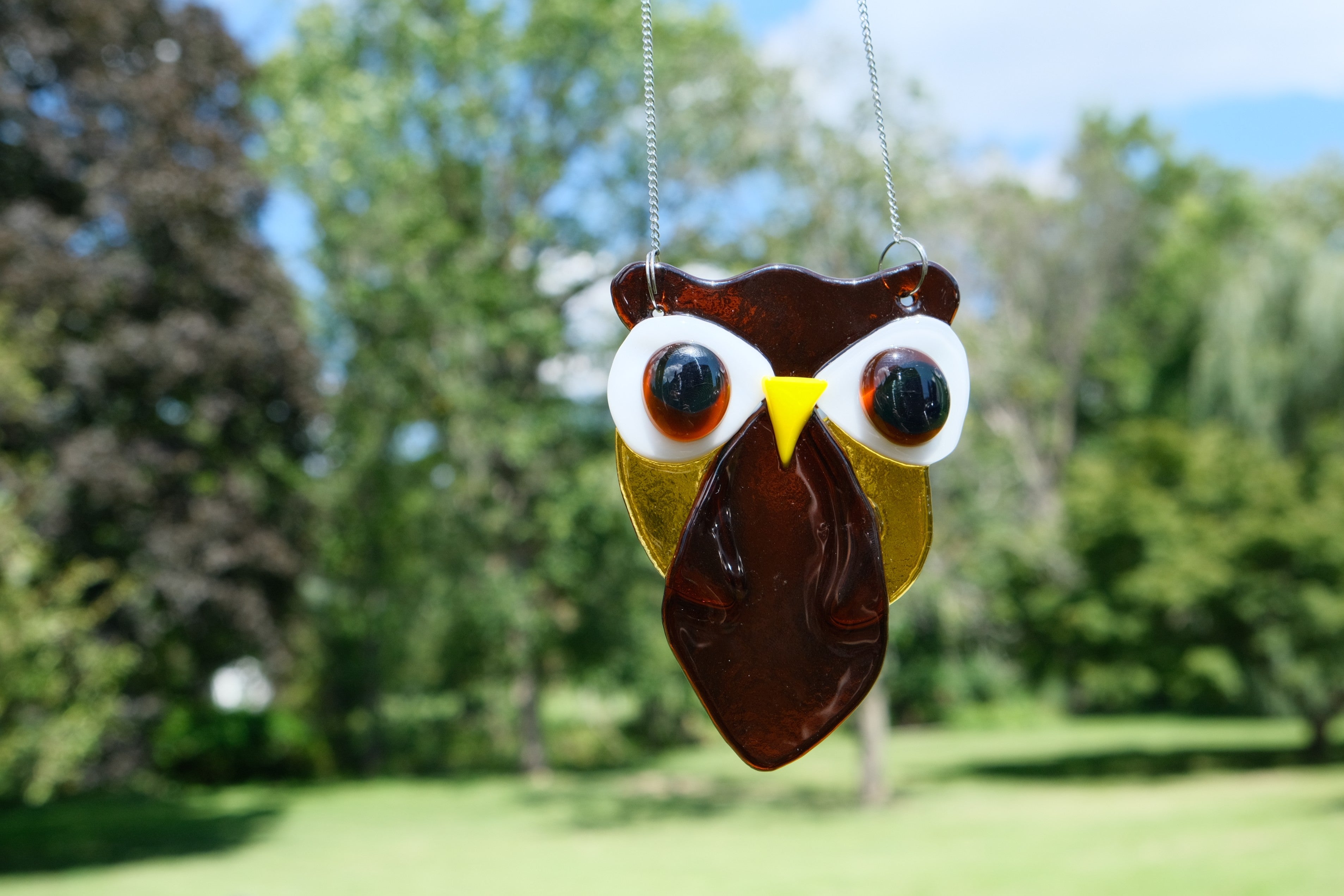 Brown and Amber Owl suncatcher, fused glass, on a steel hanging chain seedsglassworks, seeds glassworks