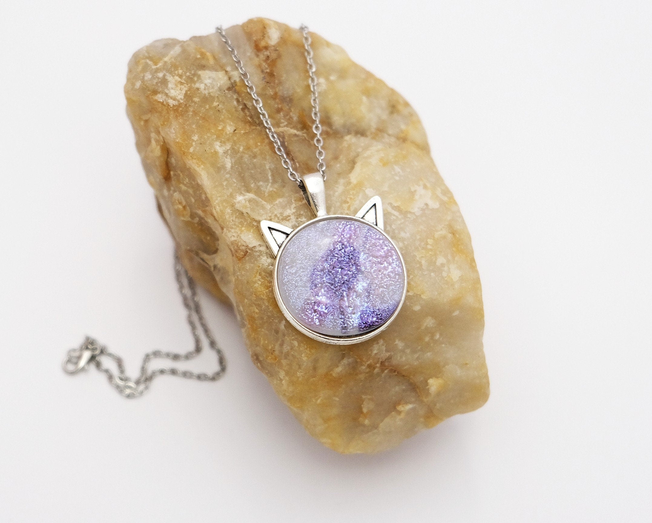 Silver Cat pendant necklace, with pink/purple/white sparkling dichroic fused glass center stone on a 20 inch steel chain seeds glassworks seedsglassworks