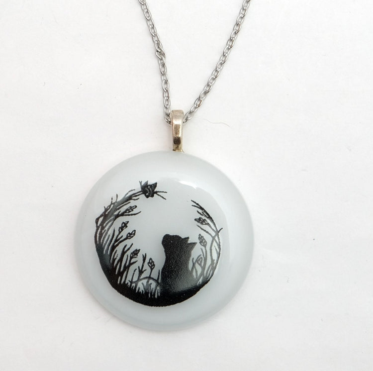Black Cat and Butterfly on White Circle Fused Glass Pendant on 20 inch steel chain seeds glassworks seedsglassworks