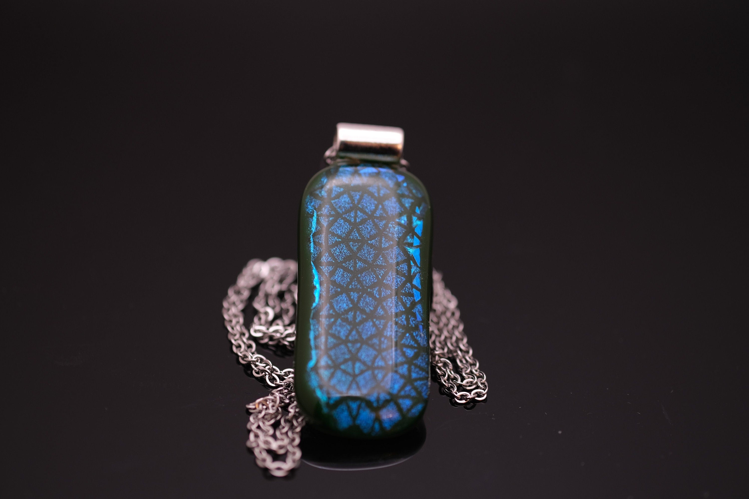 Blue patterned dichroic glass over green fused glass statement pendant necklace on 24 inch chain. 2 x 1 inch pendant seeds glassworks seedsglassworks