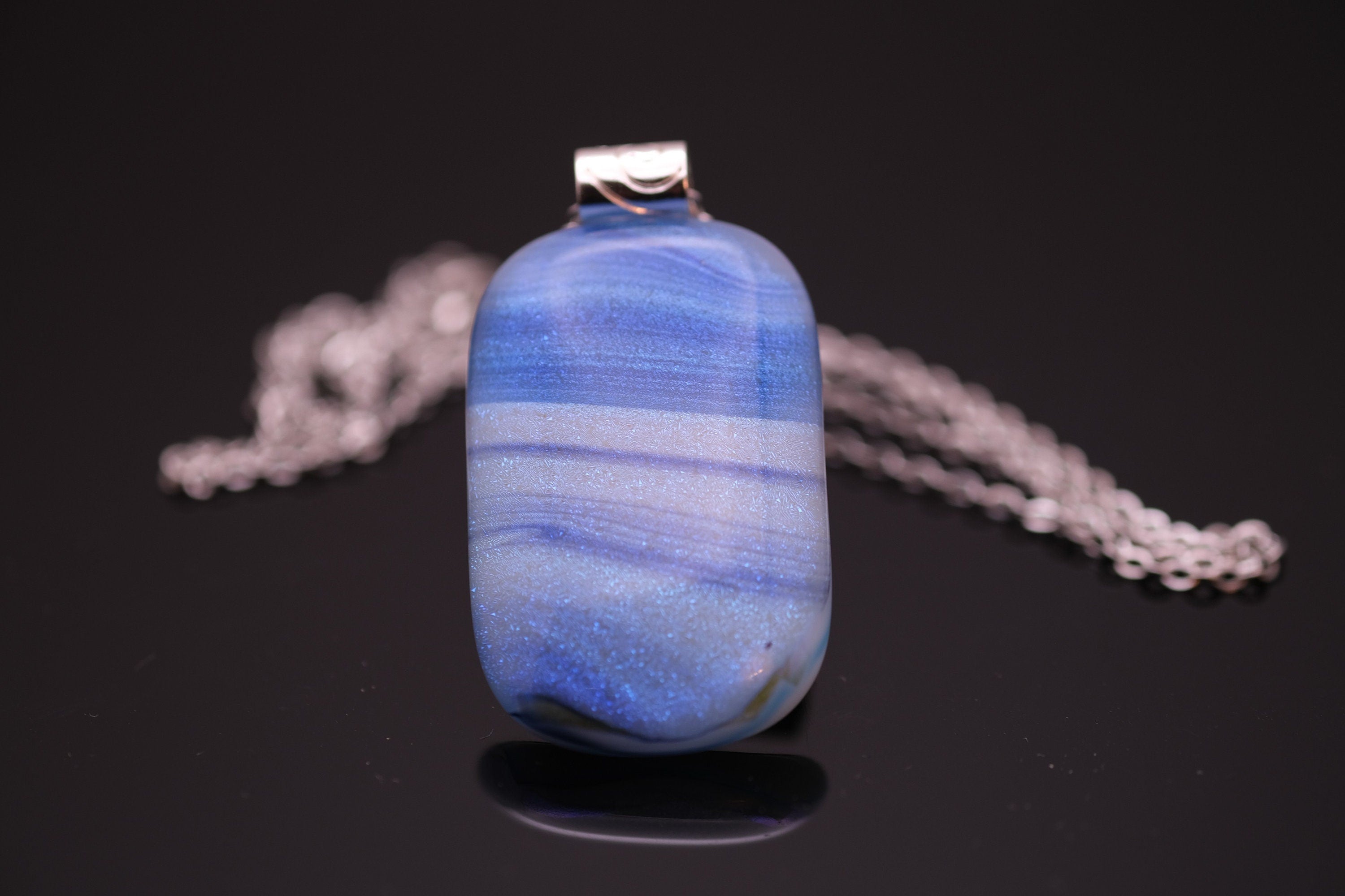 Dichroic Blue and White sparkly swirl fused glass pendant statement necklace on 24 inch steel chain. 1.75 x 1 inch pendant. sliver tone bail seeds glassworks seedsglassworks