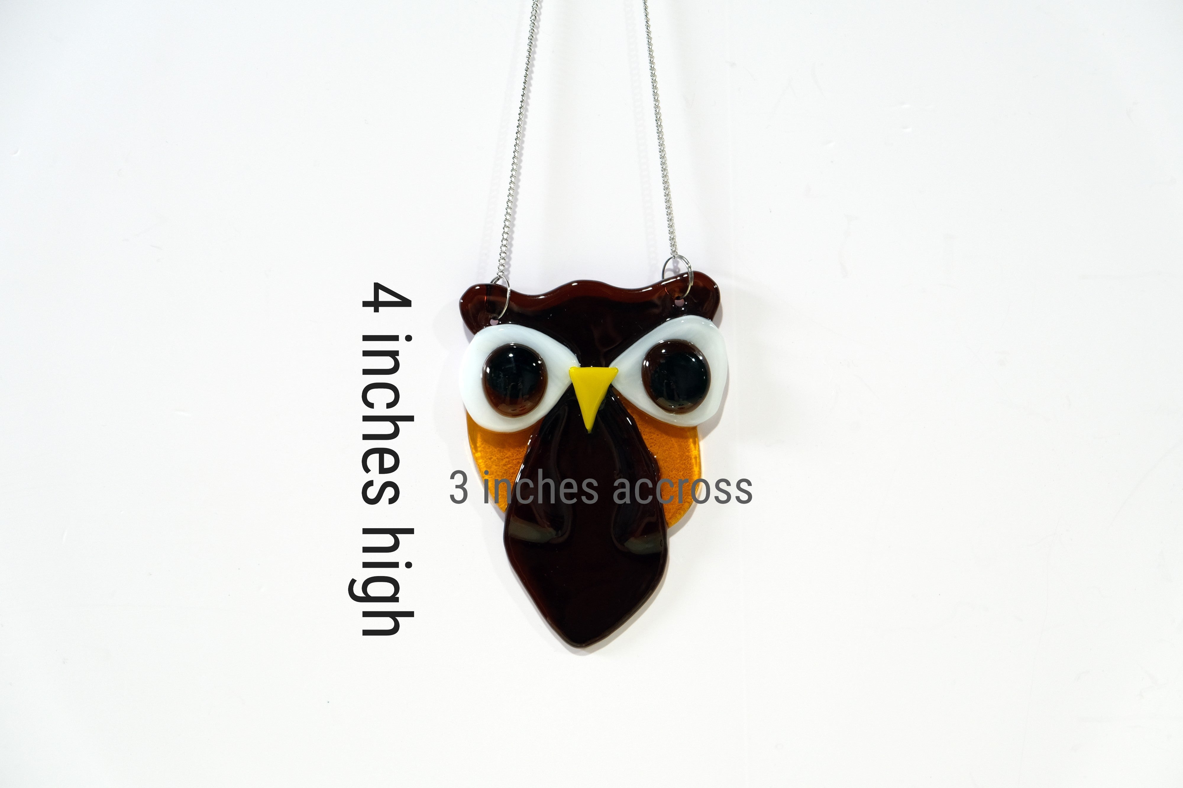 Brown and Amber Owl suncatcher, fused glass, on a steel hanging chain seedsglassworks, seeds glassworks