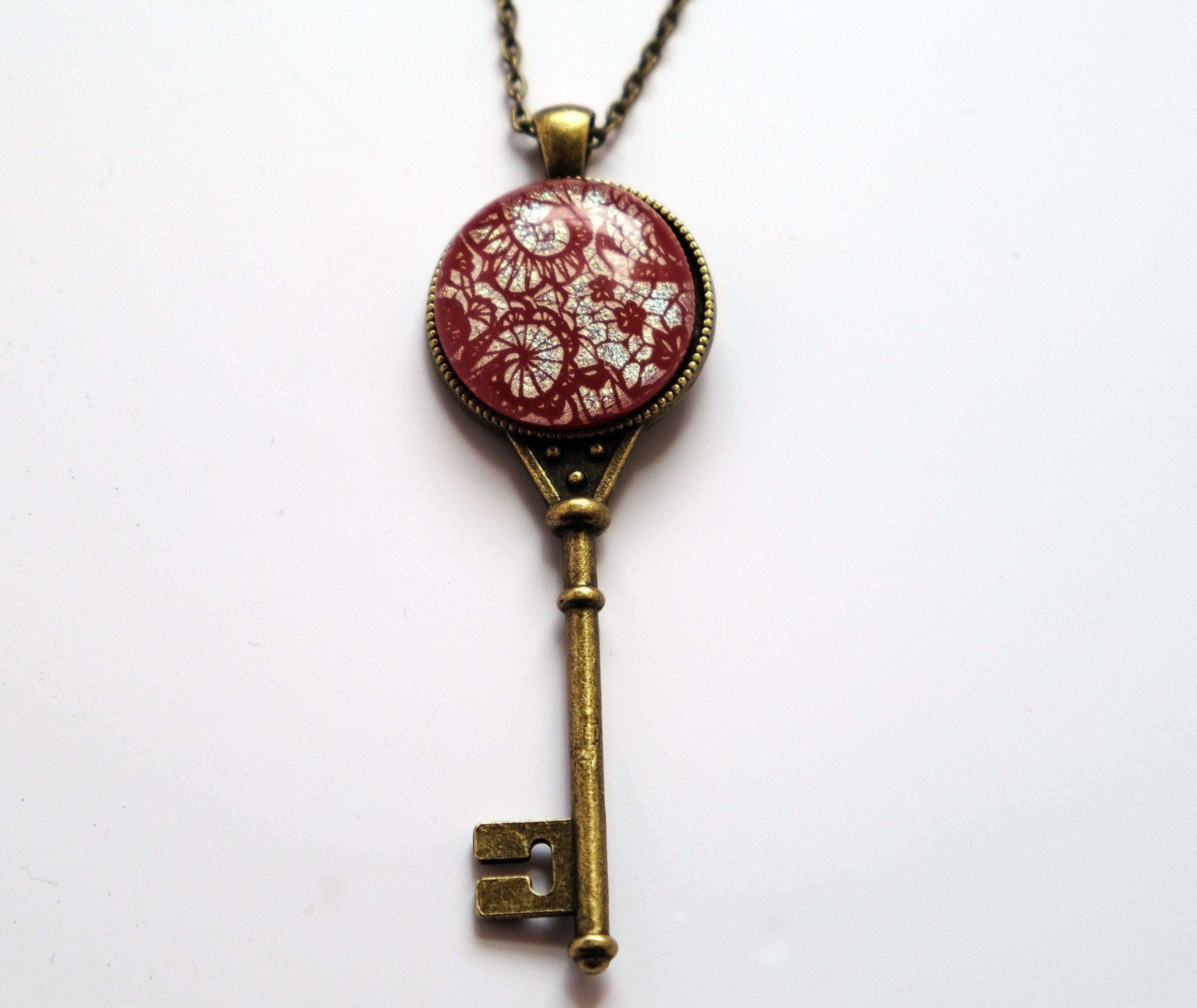 Antiqued Brass Skeleton Key pendant necklace with Fused Glass red lace Dichroic cabochon on 24 inch brass plated chain jewelry steam punk and Victorian style seeds glassworks seedsglassworks