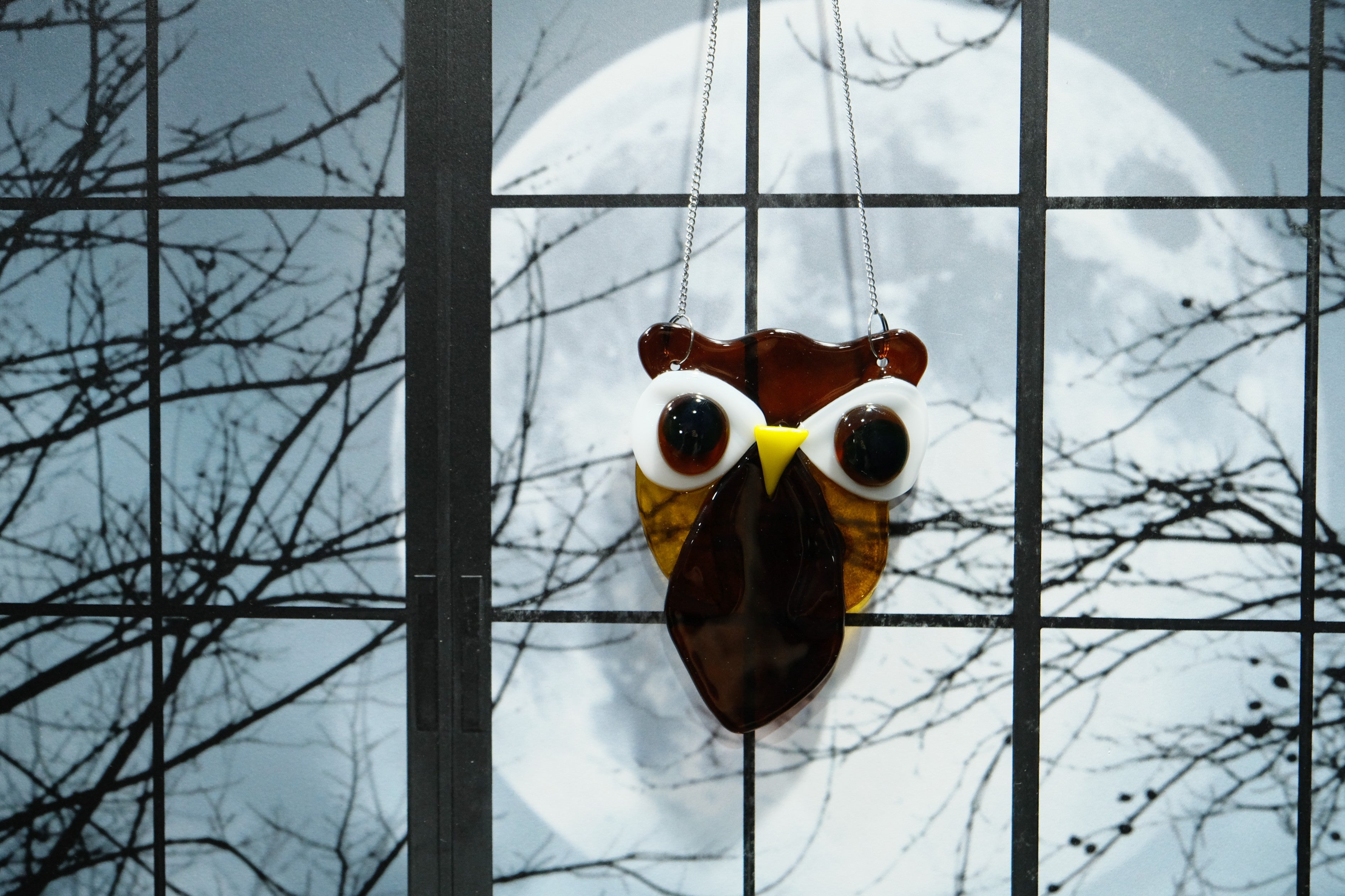 Brown and Amber Owl suncatcher, fused glass, on a steel hanging chain seedsglassworks, seeds glassworks