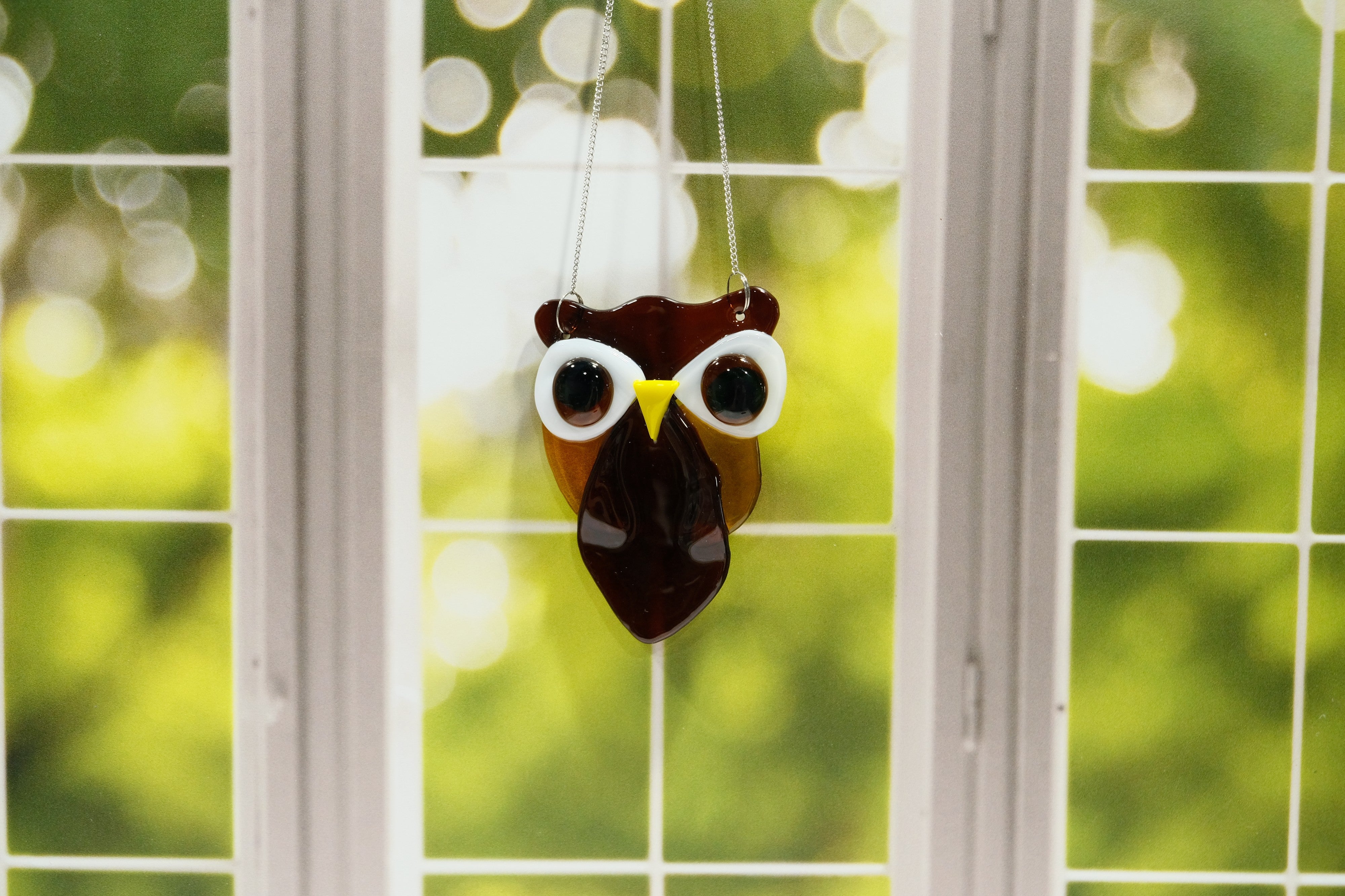 Brown and Amber Owl suncatcher, fused glass, on a steel hanging chain seedsglassworks, seeds glassworks