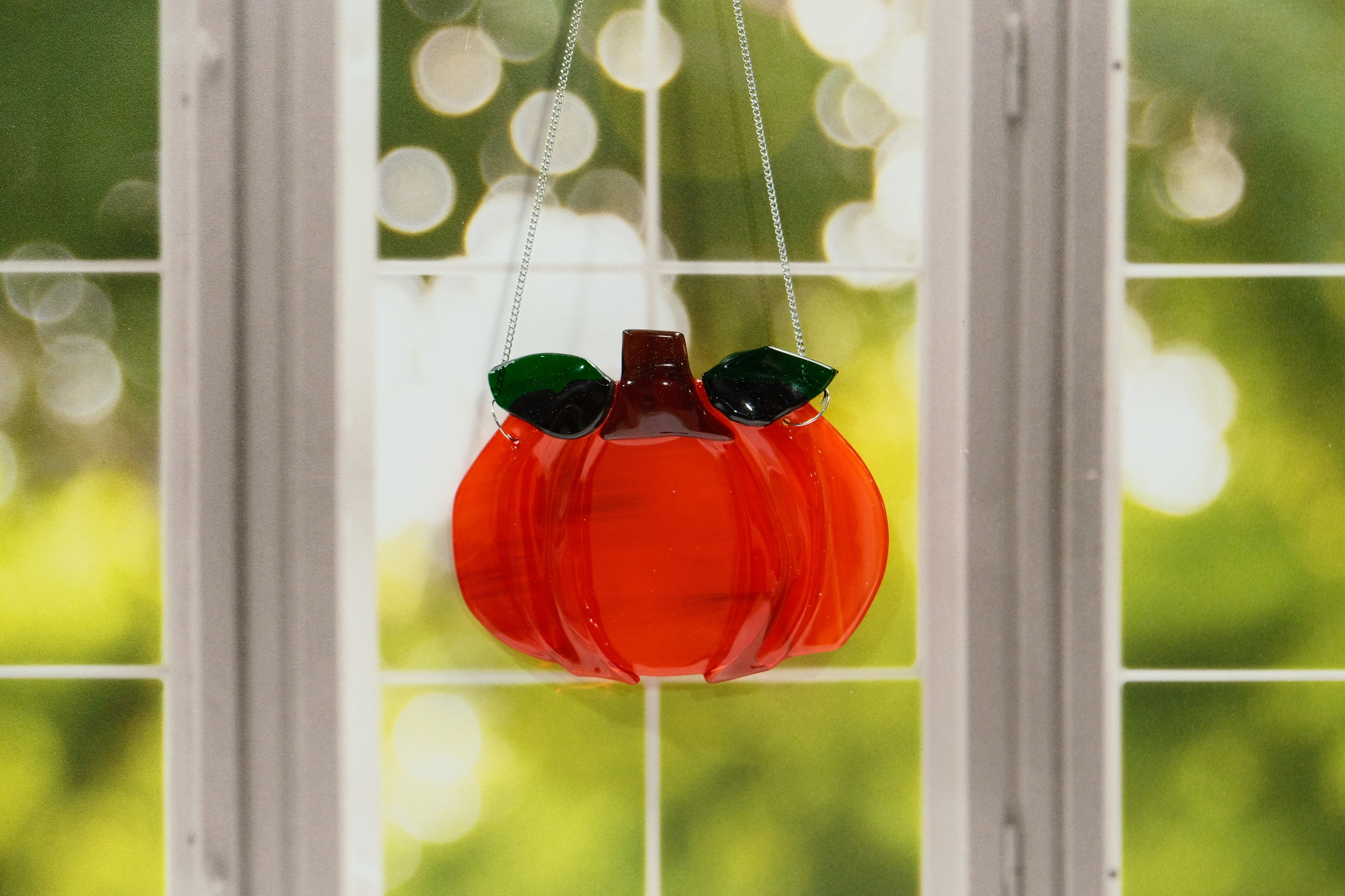 Orange Pumpkin suncatcher, fused glass on a 7 inch steel hanging chain seedsglassworks, Seeds Glassworks