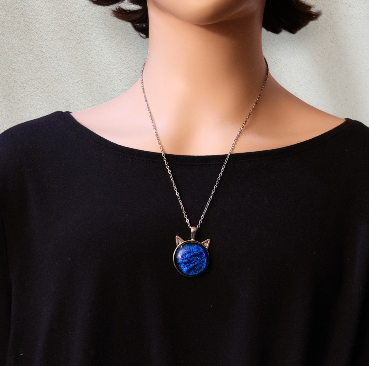 Silver Cat pendant necklace, with blue sparkling dichroic fused glass center stone on a 20 inch steel chain