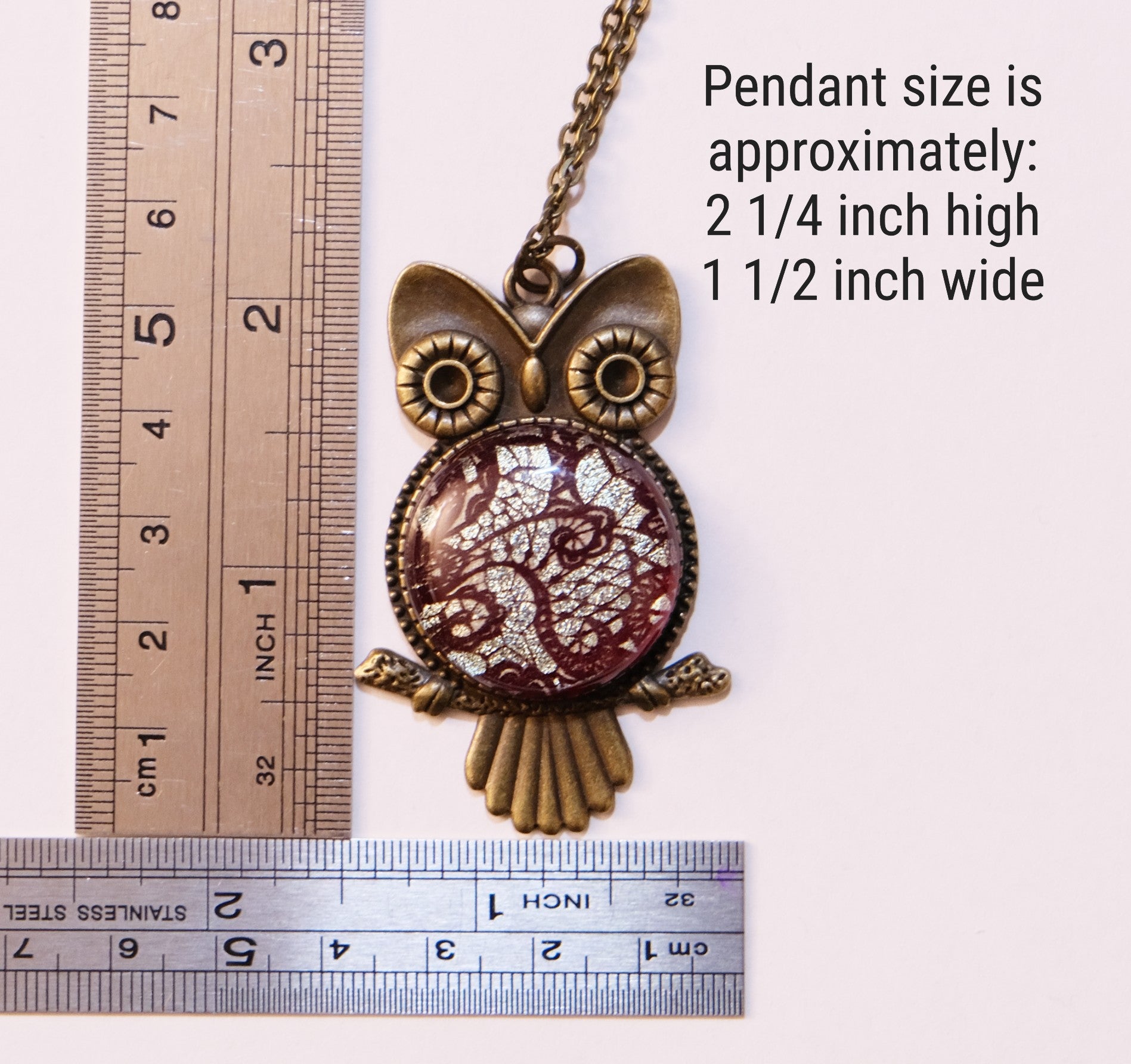 Owl pendant with measurement details on a white background