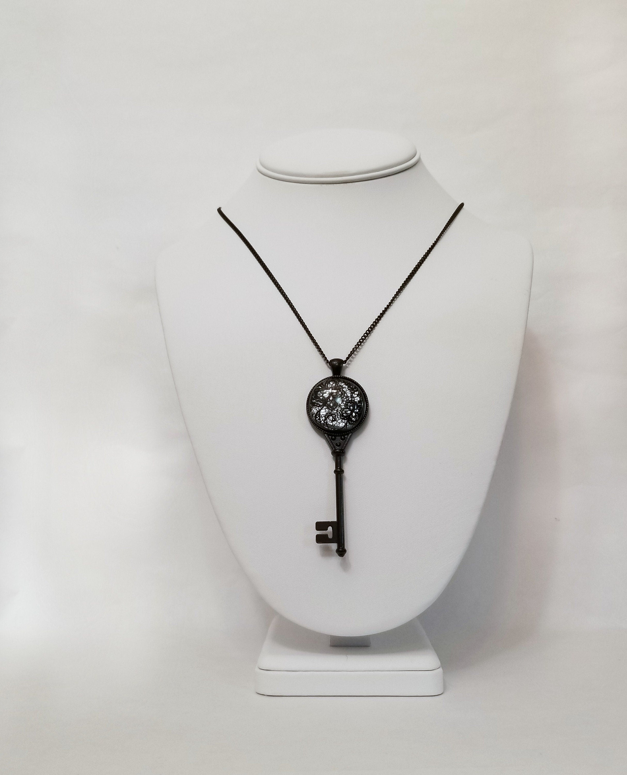 Black Metal Skeleton Key pendant necklace with Fused Glass Silver Lace cabochon on 24 inch black chain jewelry seeds glassworks seedsglassworks