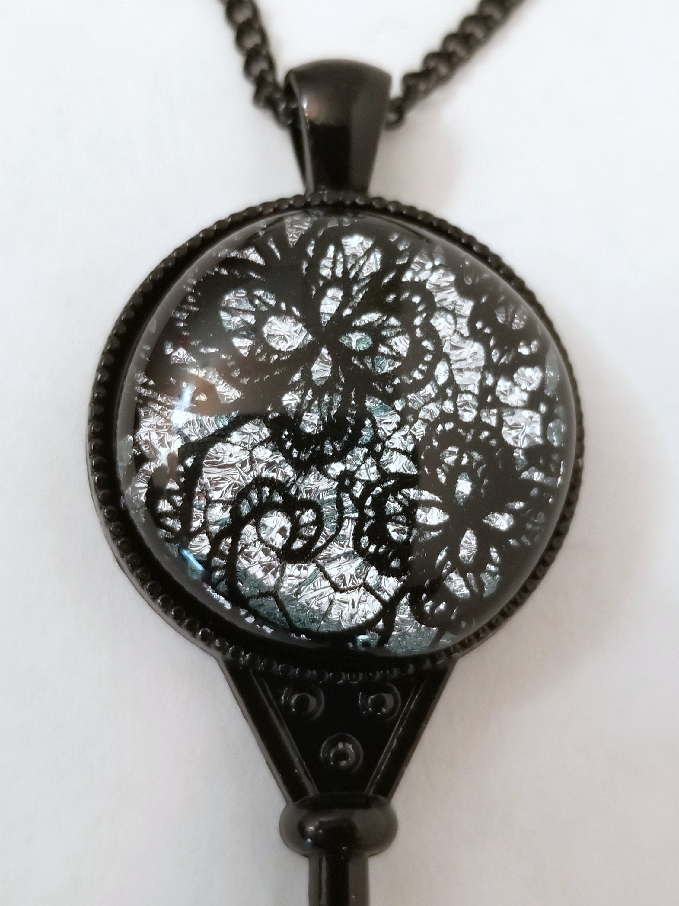 Black Metal Skeleton Key pendant necklace with Fused Glass Silver Lace cabochon on 24 inch black chain jewelry seeds glassworks seedsglassworks