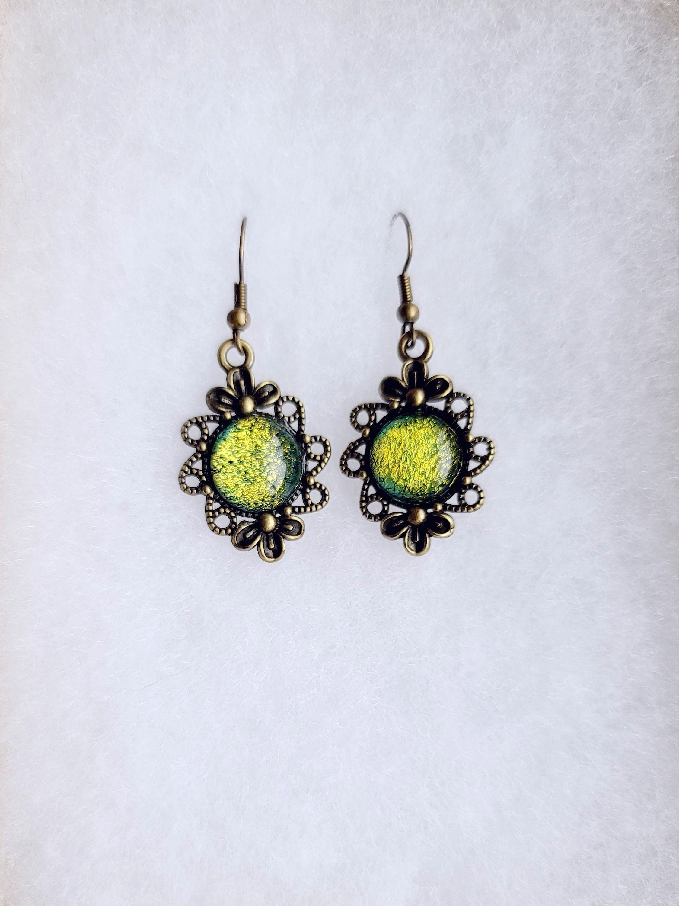 Brass flower earrings with color shifting green/yellow dichroic fused glass cabo pierced earrings seeds glassworks seedsglassworks