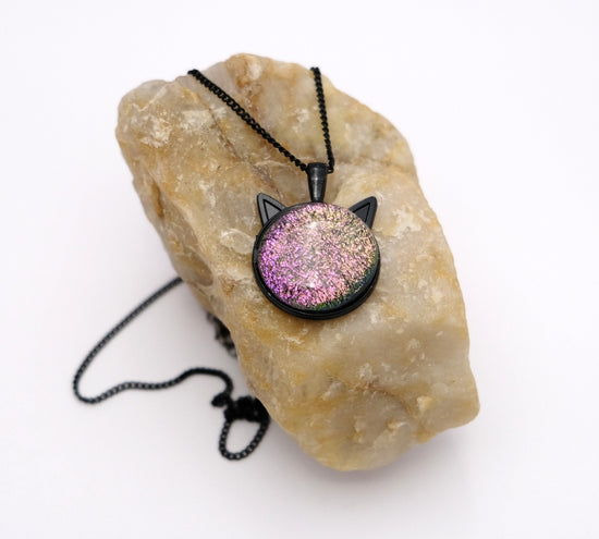 Magical Black Cat Pendant Necklace with pink/green Color-Shifting Dichroic Glass Center Stone on 20 in black chain seeds glassworks seedsglassworks