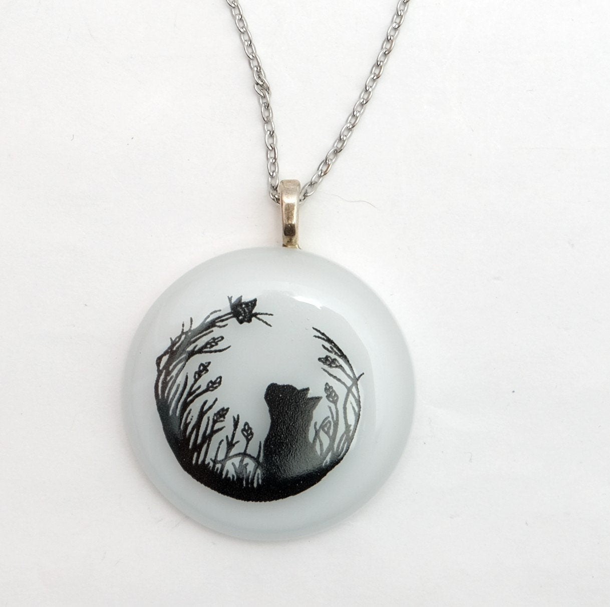 Black Cat and Butterfly on White Circle Fused Glass Pendant on 20 inch steel chain seeds glassworks seedsglassworks
