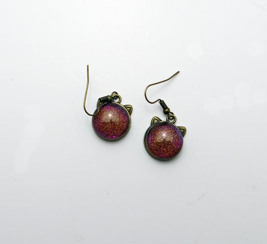 Whimsical Cat Head Shaped Pierced Earrings - Brass Tone with pinkish orange Dichroic Glass