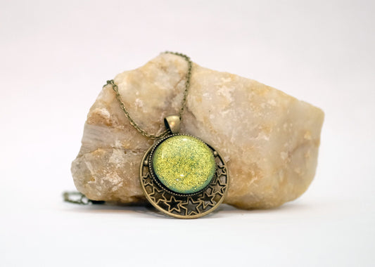Brass Moon and Stars Pendant Necklace with Green dichroic glass cabochon on a 20 inch brass  chain.