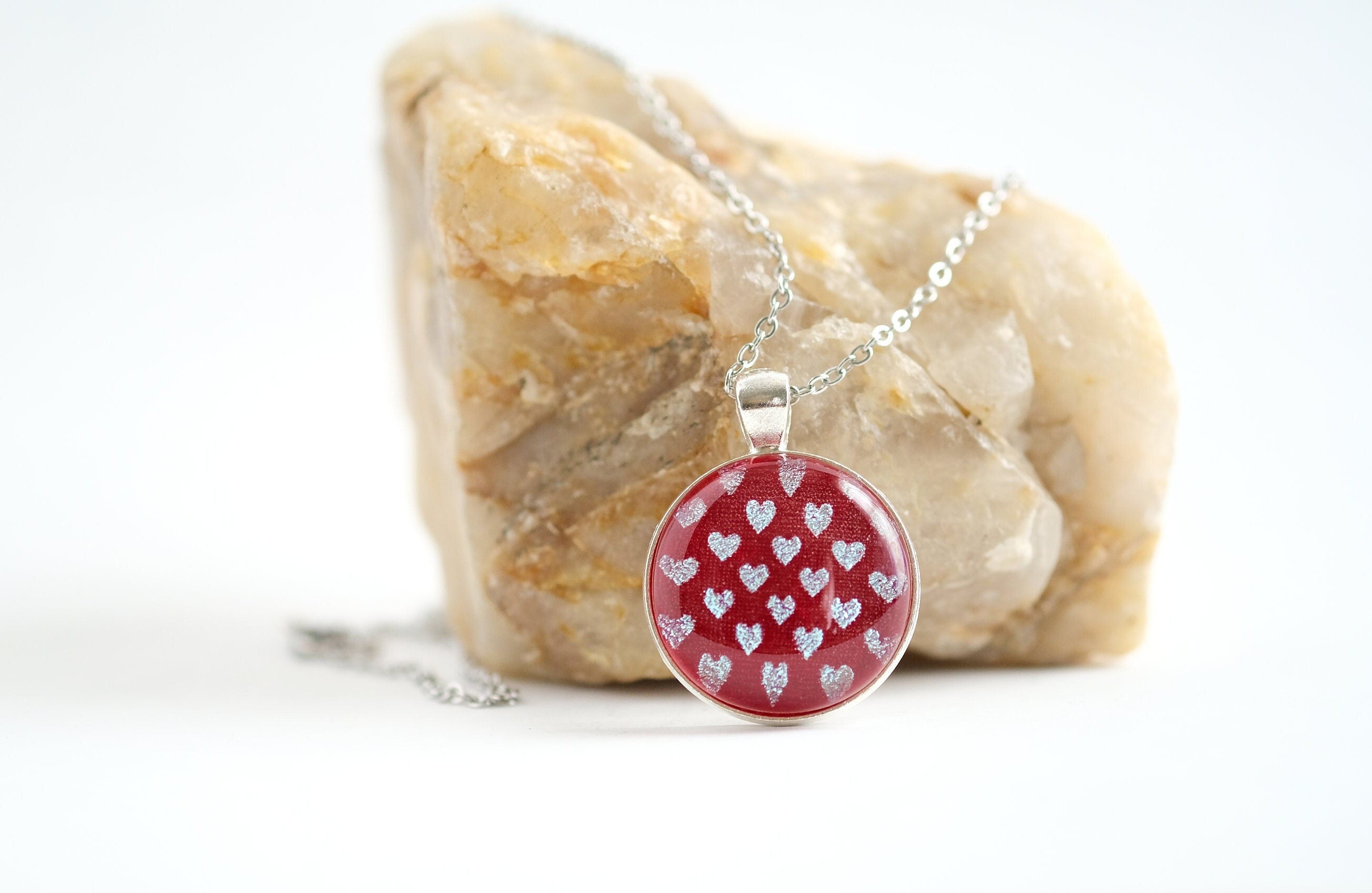 Silver tone  pendant necklace with Fused Glass Red with dichroic hearts pattern cabochon on 24 inch steel chain jewelry seeds glassworks seedsglassworks