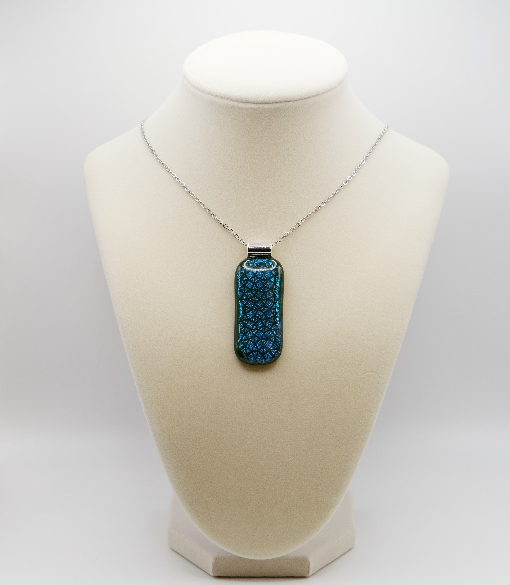 Blue patterned dichroic glass over green fused glass statement pendant necklace on 24 inch chain. 2 x 1 inch pendant seeds glassworks seedsglassworks