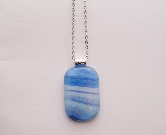 Dichroic Blue and White sparkly swirl fused glass pendant statement necklace on 24 inch steel chain. 1.75 x 1 inch pendant. sliver tone bail seeds glassworks seedsglassworks