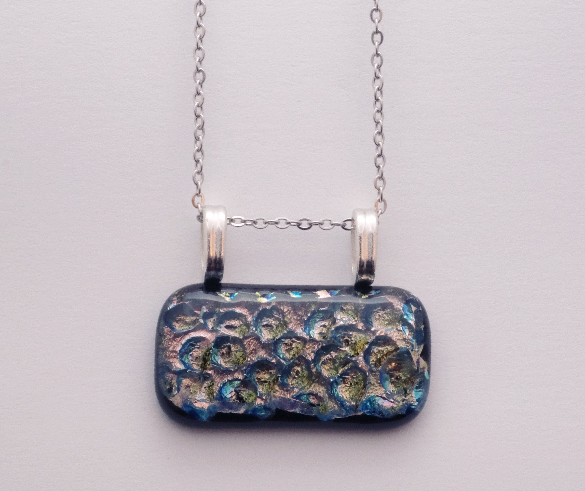 Dazzling Dichroic Rainbow-Silver fused glass statement pendant necklace on 24 inch chain. 1.5 x 1.25 inch pendant seeds glassworks seedsglassworks