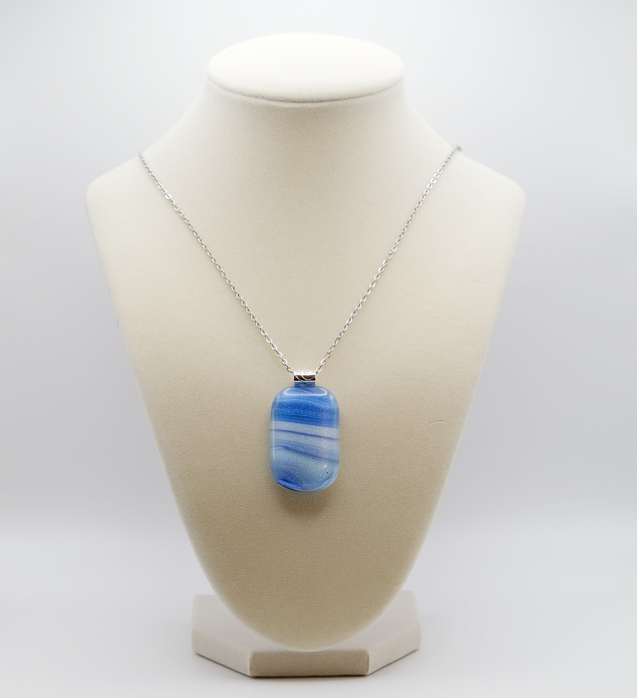 Dichroic Blue and White sparkly swirl fused glass pendant statement necklace on 24 inch steel chain. 1.75 x 1 inch pendant. sliver tone bail seeds glassworks seedsglassworks