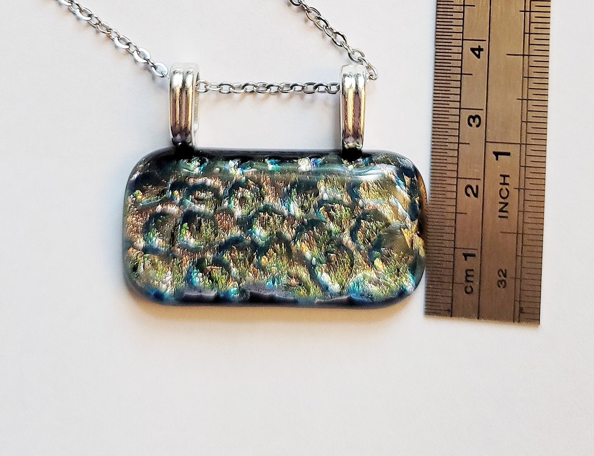 Dazzling Dichroic Rainbow-Silver fused glass statement pendant necklace on 24 inch chain. 1.5 x 1.25 inch pendant seeds glassworks seedsglassworks