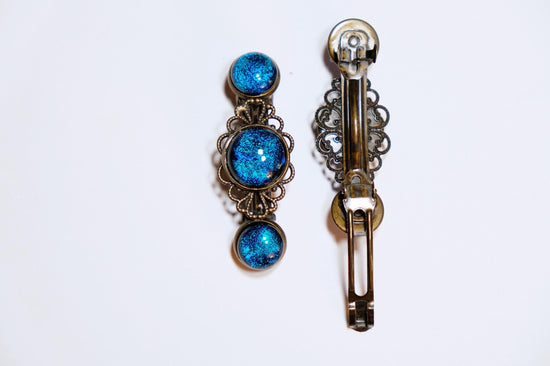Barrette pair, bronze flowers with blue dichroic fused glass cabochons, french clip, 2 1/4 inches seeds glassworks seedsglassworks