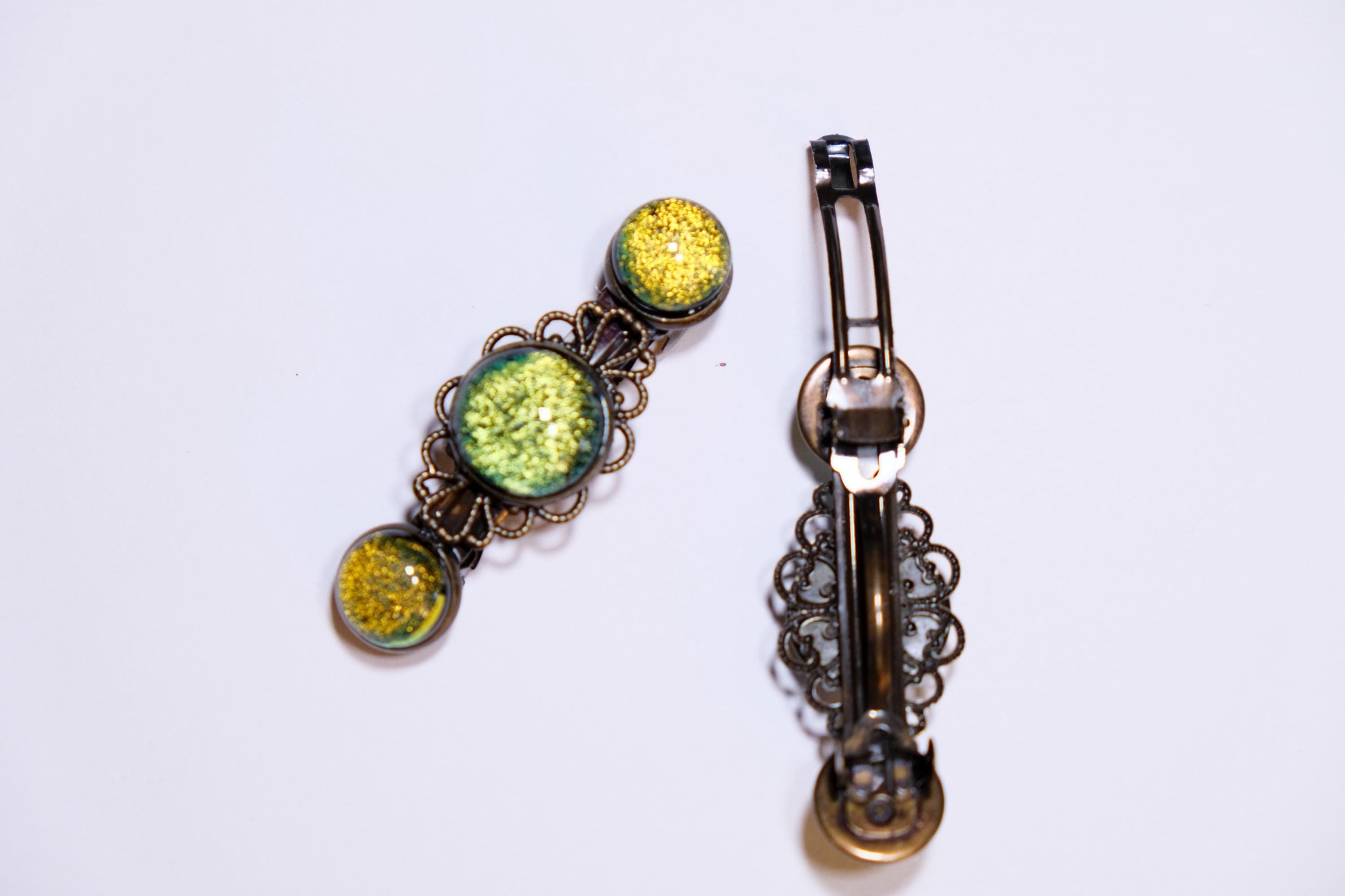 Barrette pair, bronze flowers with yellow/green dichroic fused glass cabochons, french clip, 2 1/4 inches