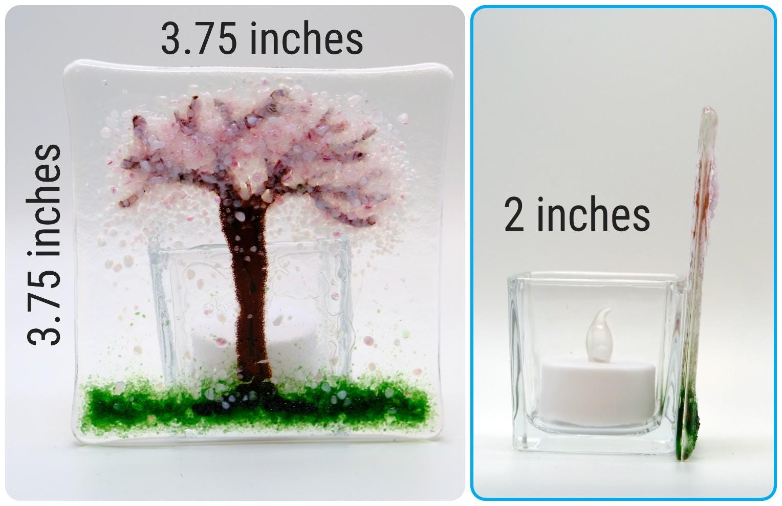 Two glass items with measurements: a cherry blossom tree design and a candle holder.