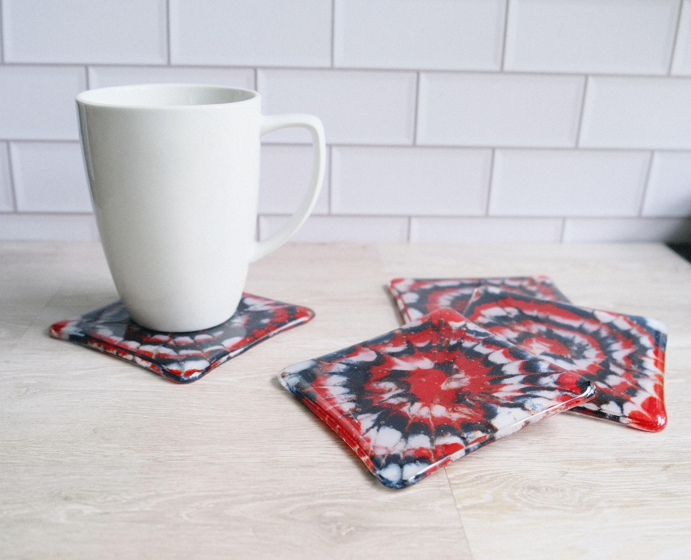 Set of 4 fused glass drink coasters with a red, blue, and white tie-dye design, featuring a patriotic and nautical vibe.