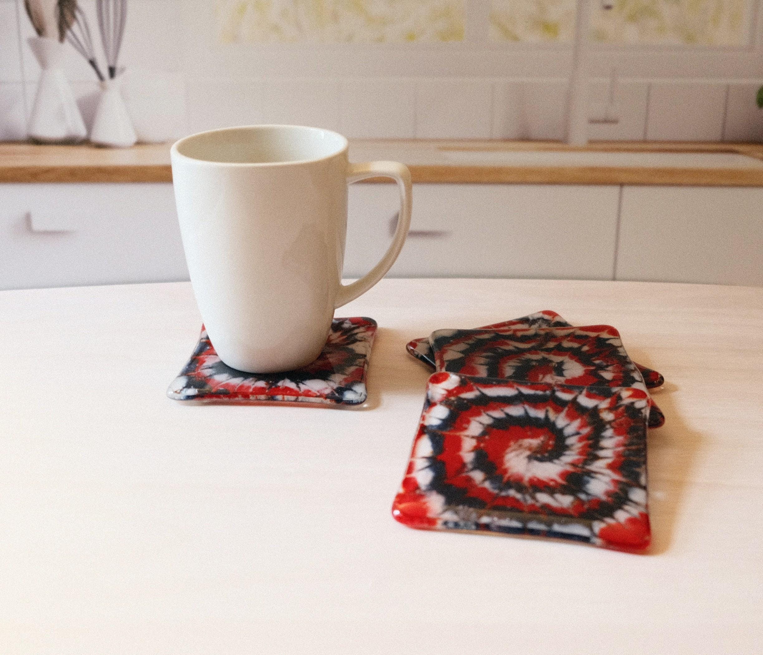 Set of 4 fused glass drink coasters with a red, blue, and white tie-dye design, featuring a patriotic and nautical vibe.