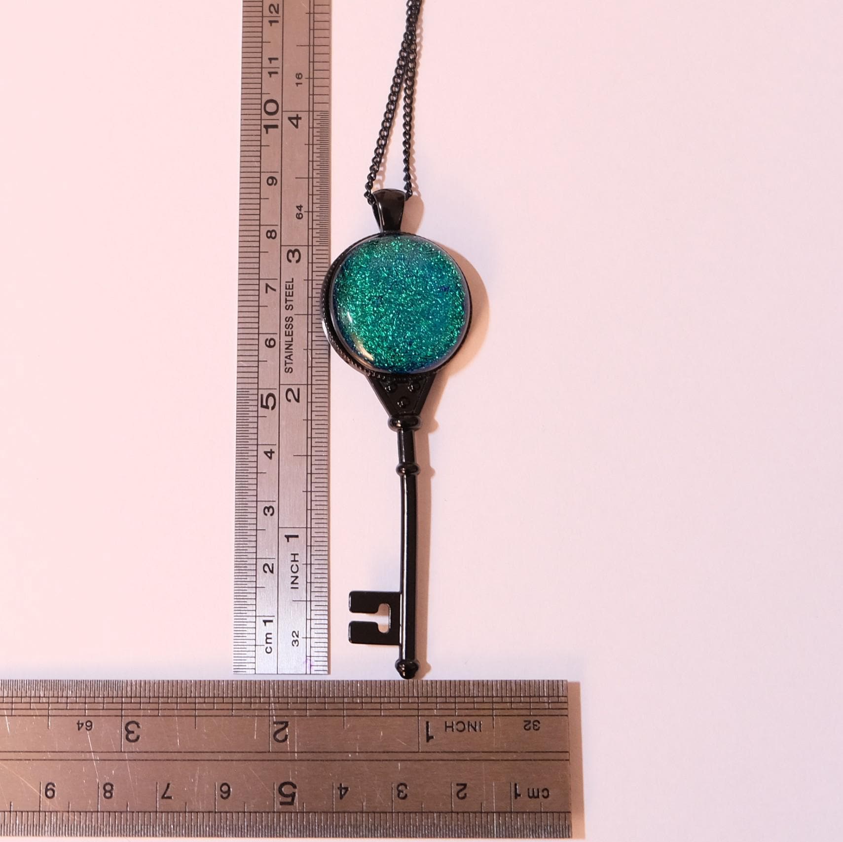 Black Metal Skeleton Key pendant necklace with Green Blue Dichroic Fused Glass cabochon on 24-inch black chain jewelry. steampunk Victorian