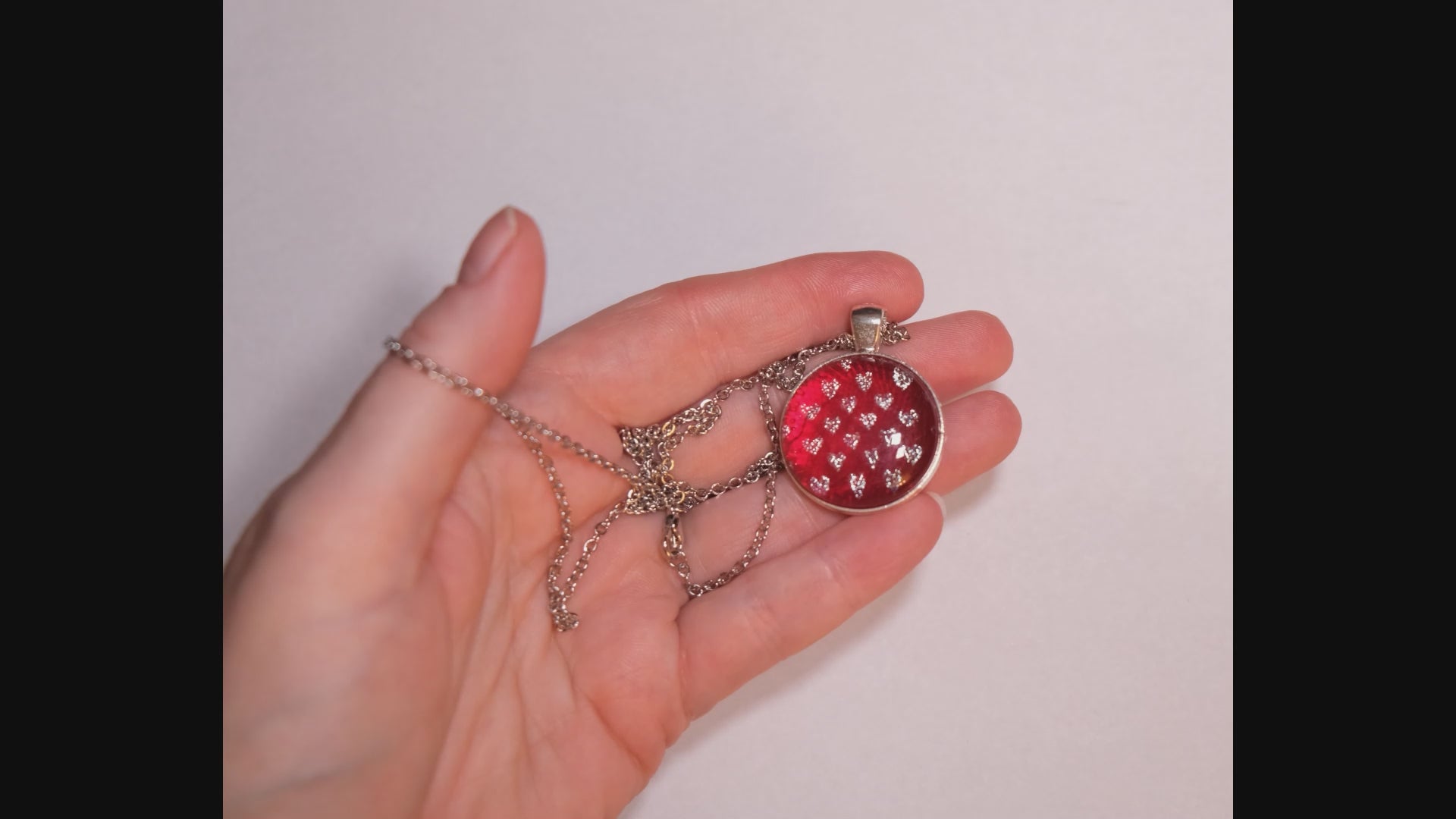 Silver tone  pendant necklace with Fused Glass Red with dichroic hearts pattern cabochon on 24 inch steel chain jewelry seeds glassworks seedsglassworks