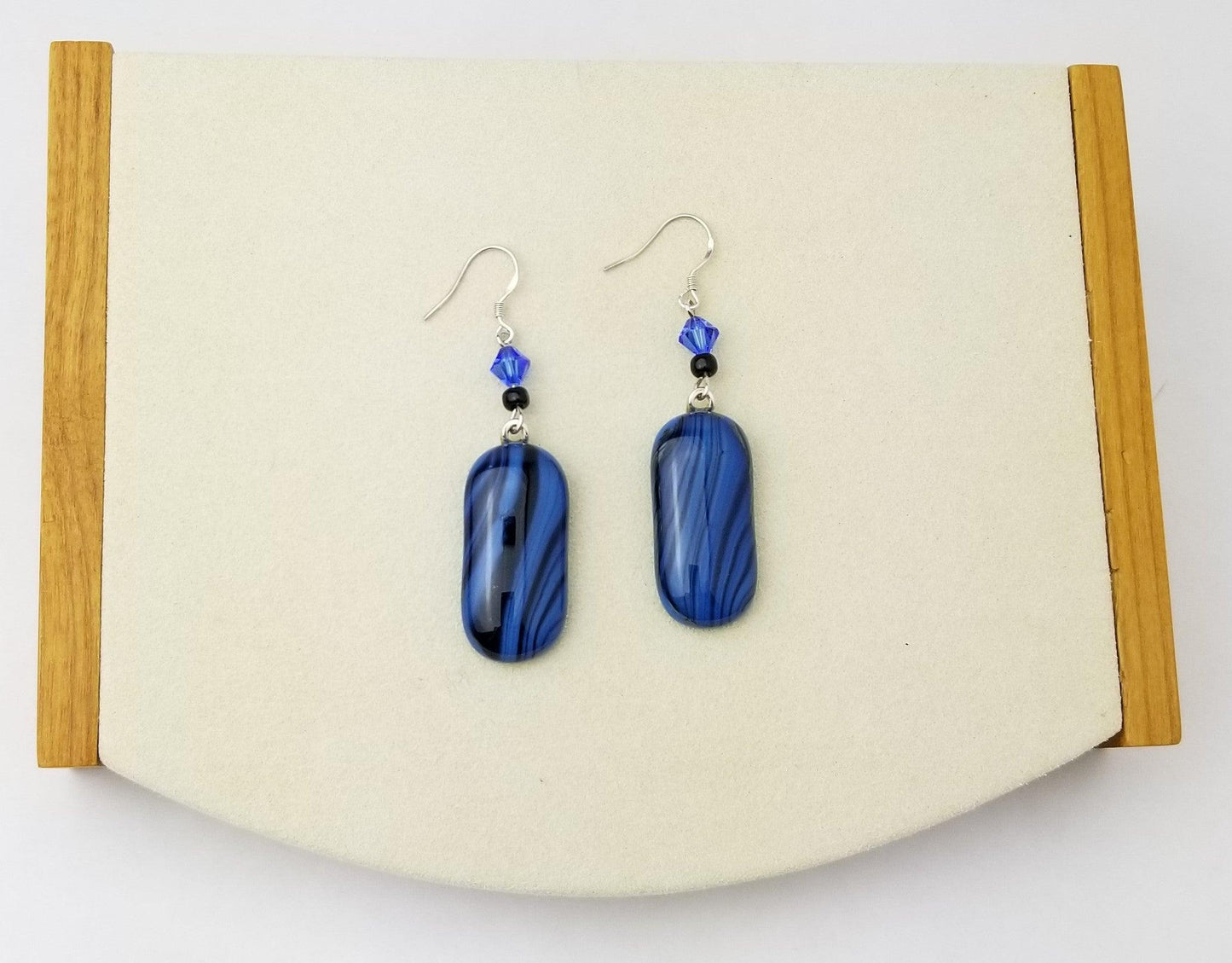 Blue and Black swirled fused glass pierced dangle earring with sterling silver ear wires from seeds glassworks