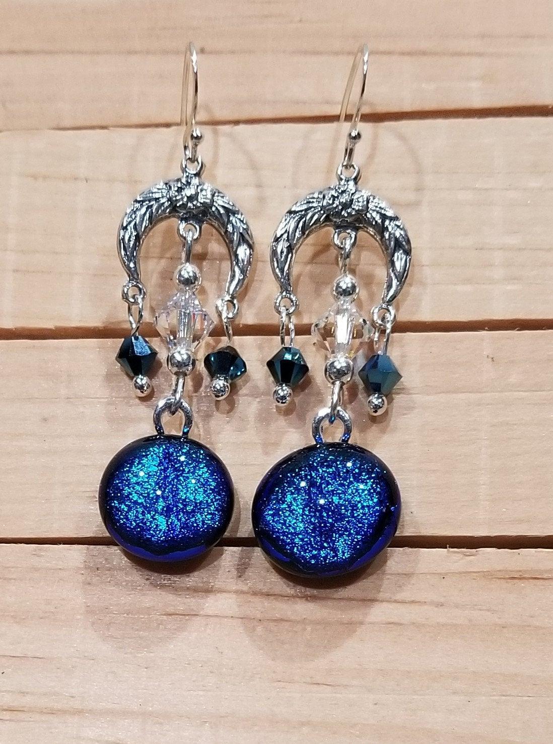 Blue Floral Crescent pireced earrings. Blue dichroic fused glass with Swarovski crystals & sterling silver by Seeds Glassworks, Seedsglassworks