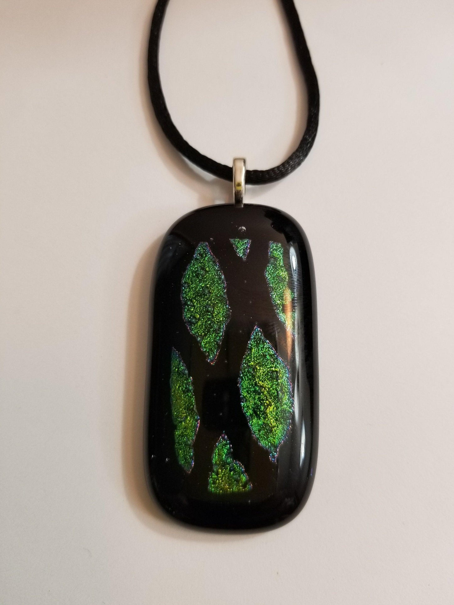 Green and Black Animal print fused glass pendant necklace with 18 inch black cord