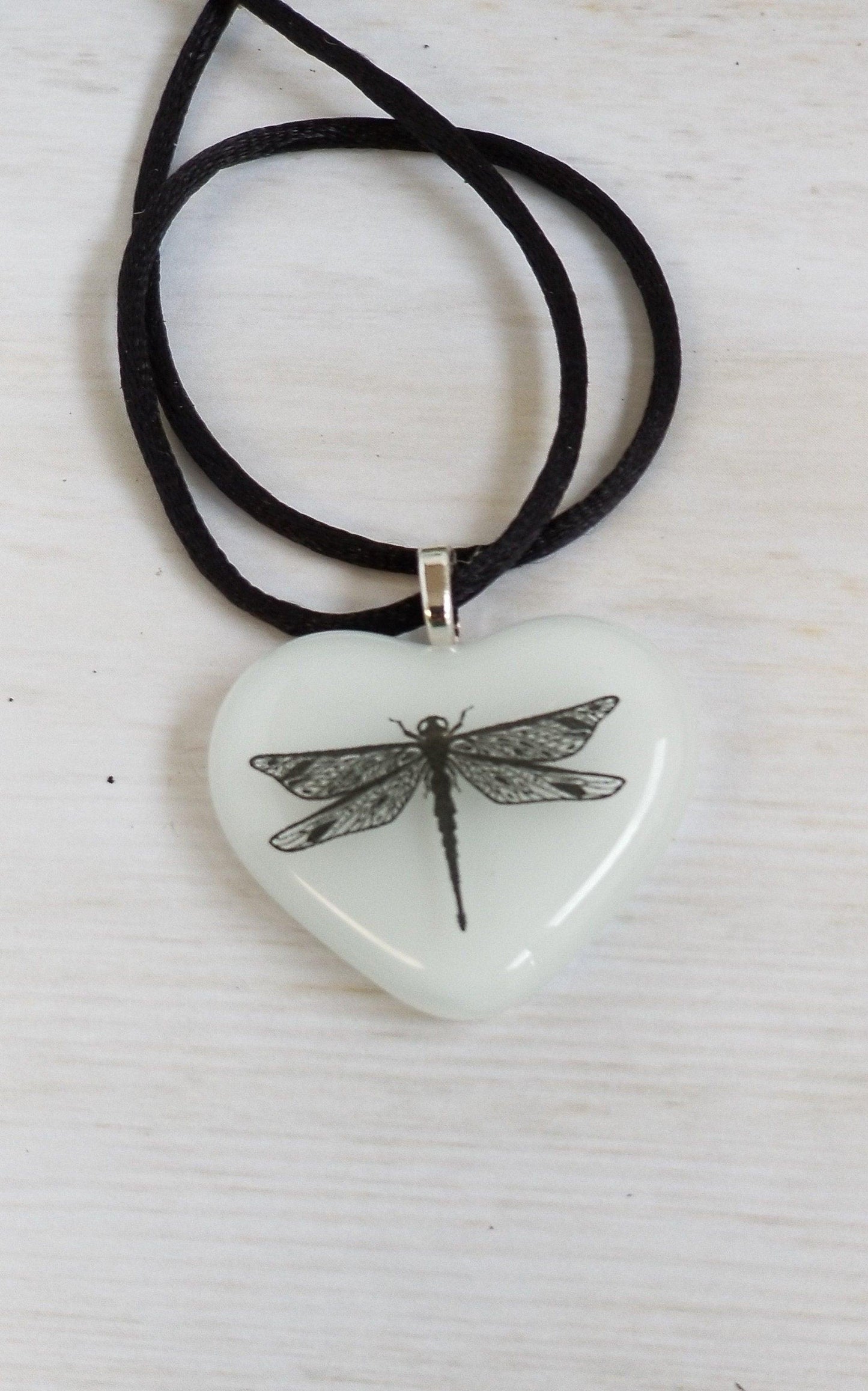 Products Black and White Dragonfly Heart Fused Glass Pendant on 18 inch black cord or 20 inch steel chain seeds glassworks seedsglassworks