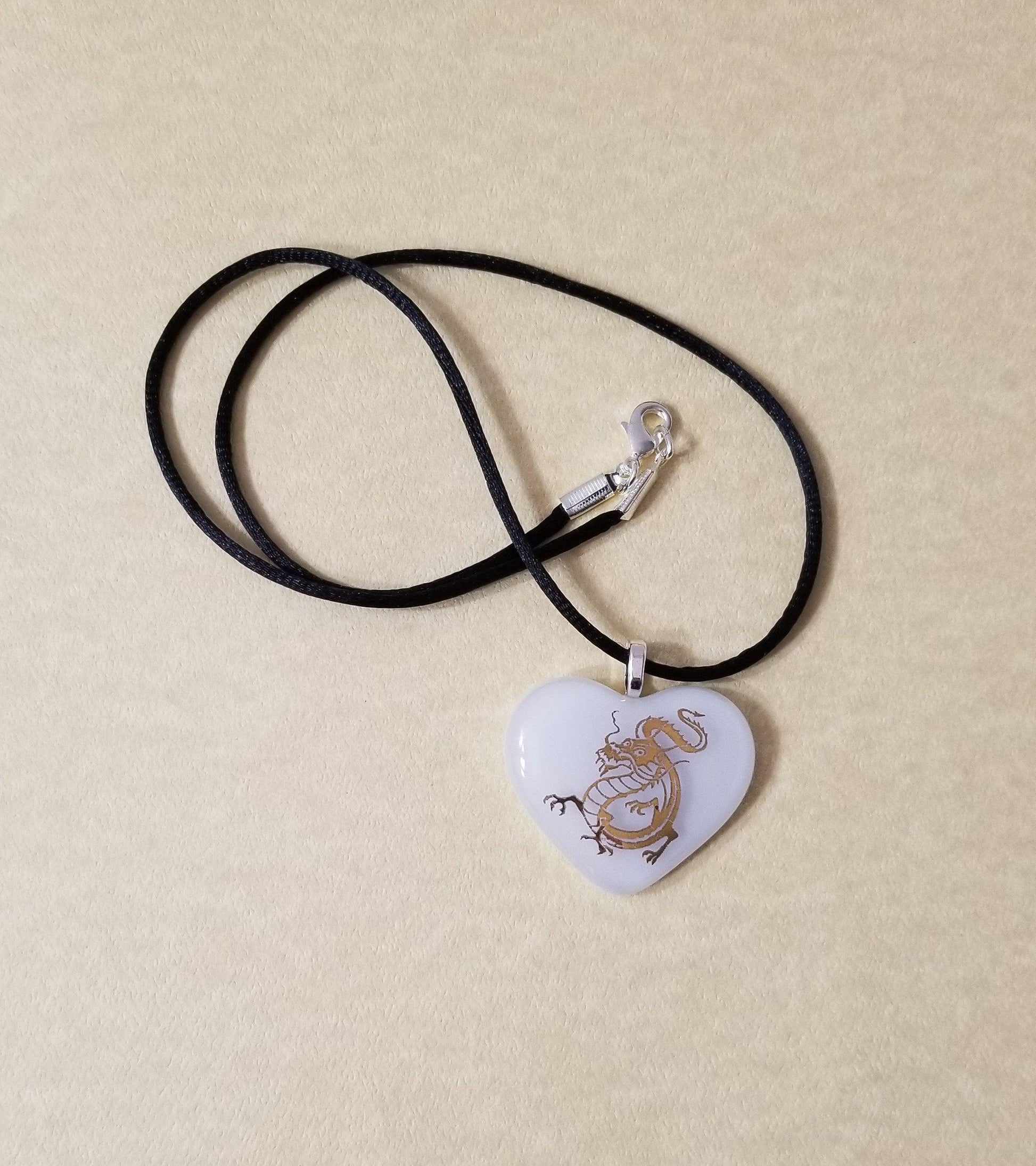 Gold Dragon on White Heart Fused Glass Pendant from seeds glassworks