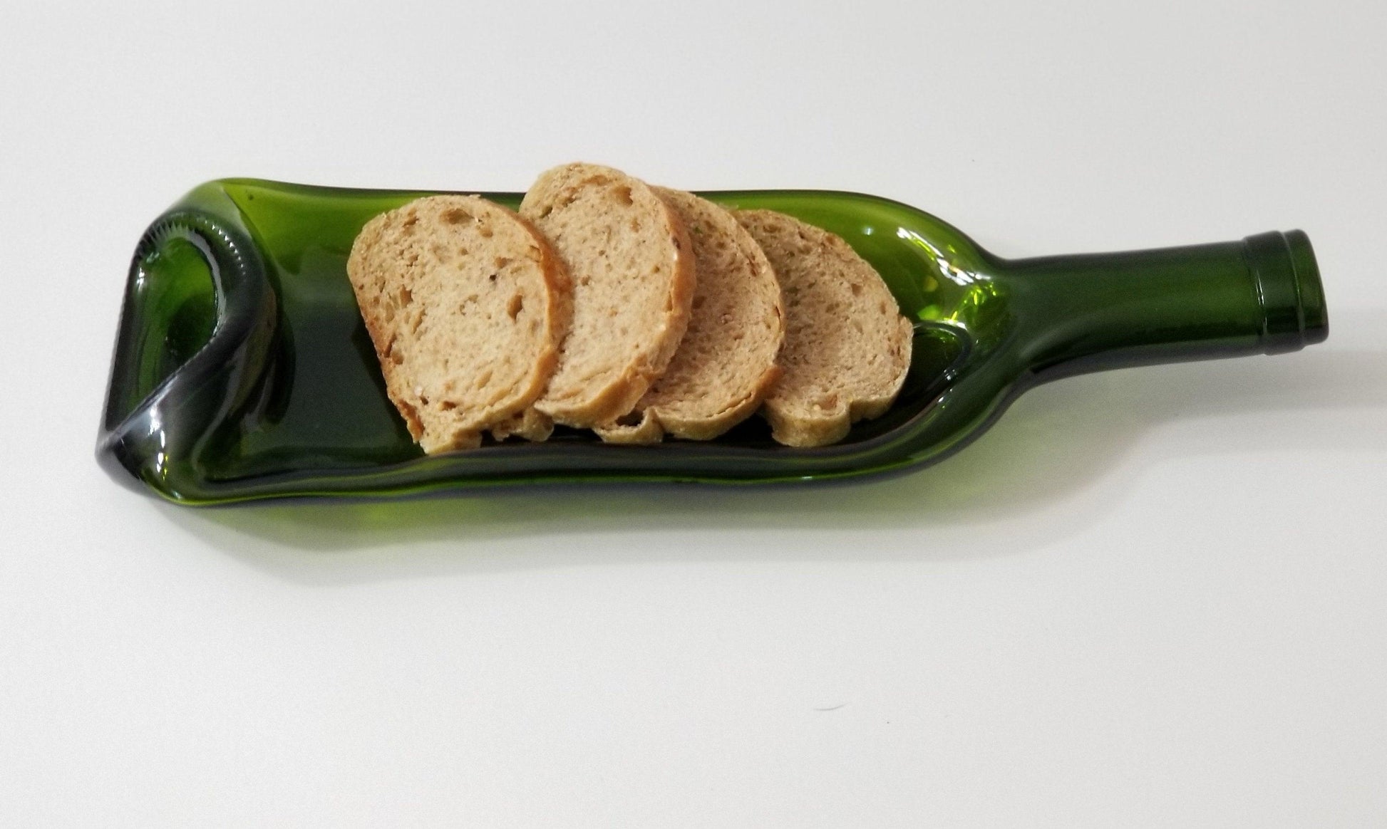 Recycled and upcycled Green slumped wine bottle, deep slump bowl type by Seeds glassworks, Seedsglasworks 