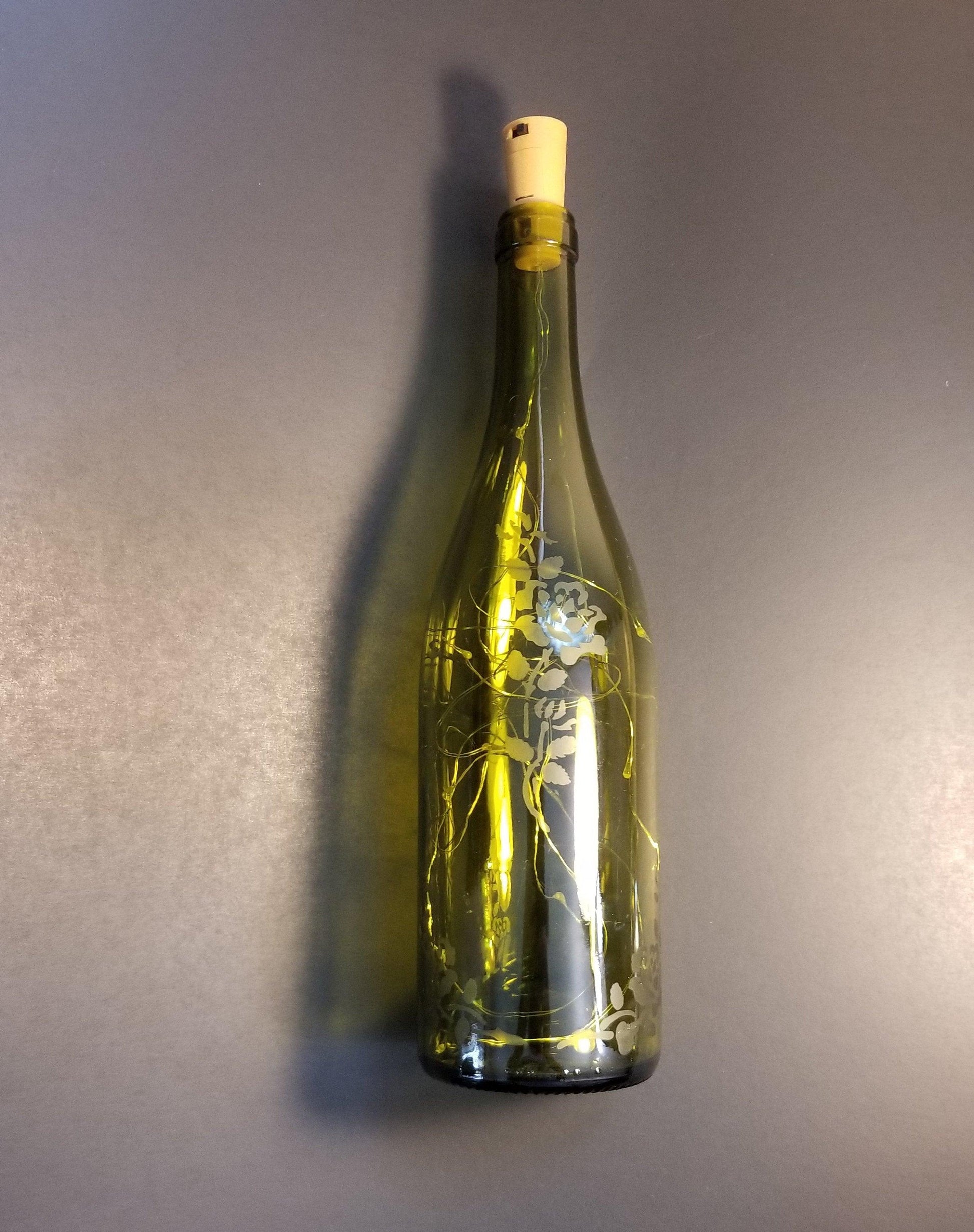 Recycled Wine Bottle with Fairy Lights and Rose Etching from seeds glassworks
