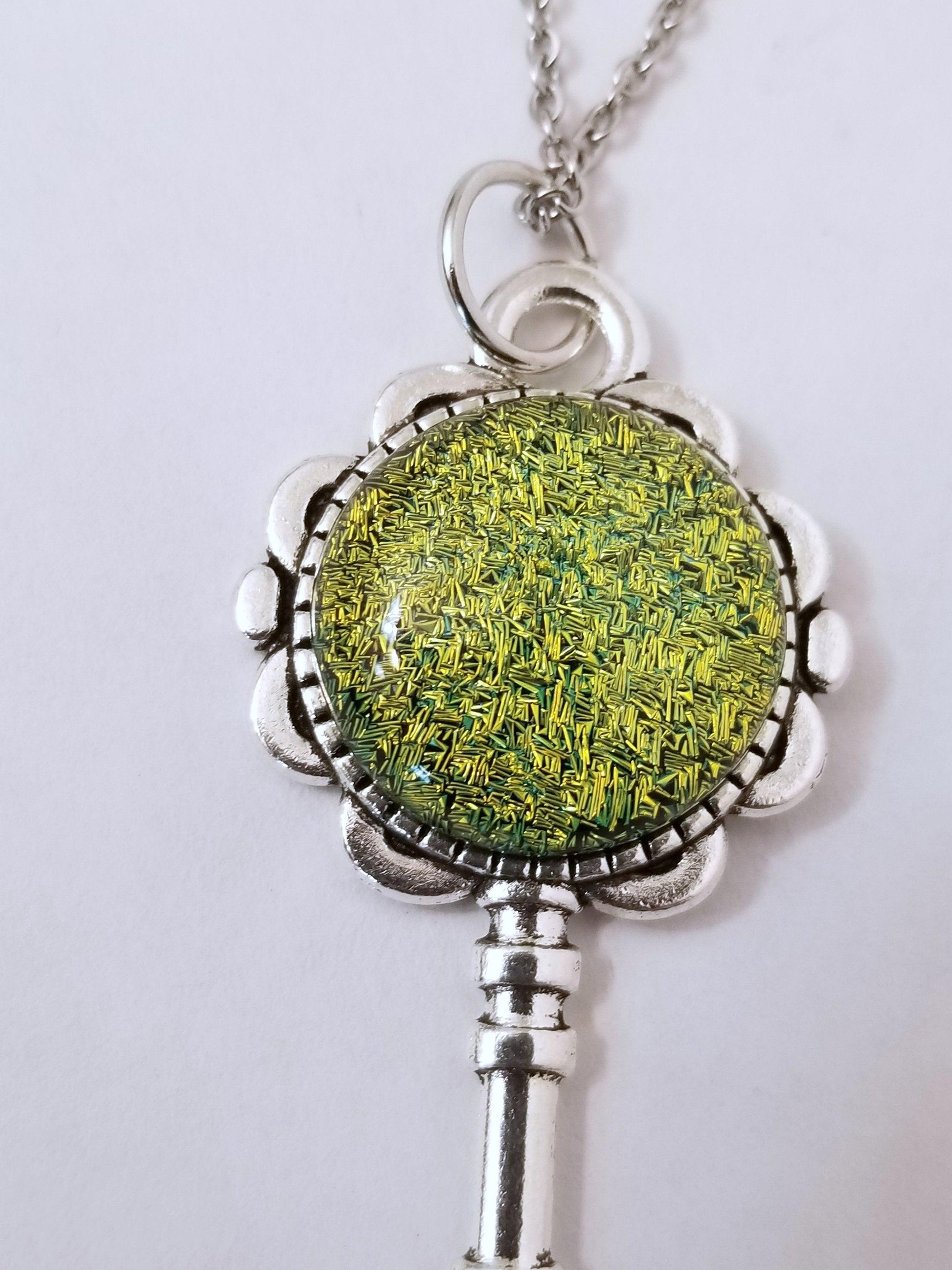 Silver finish Flowered Skeleton Key with Fused Glass Green Dichroic cabochon on 24 inch stainless steel chain Seeds Glassworks