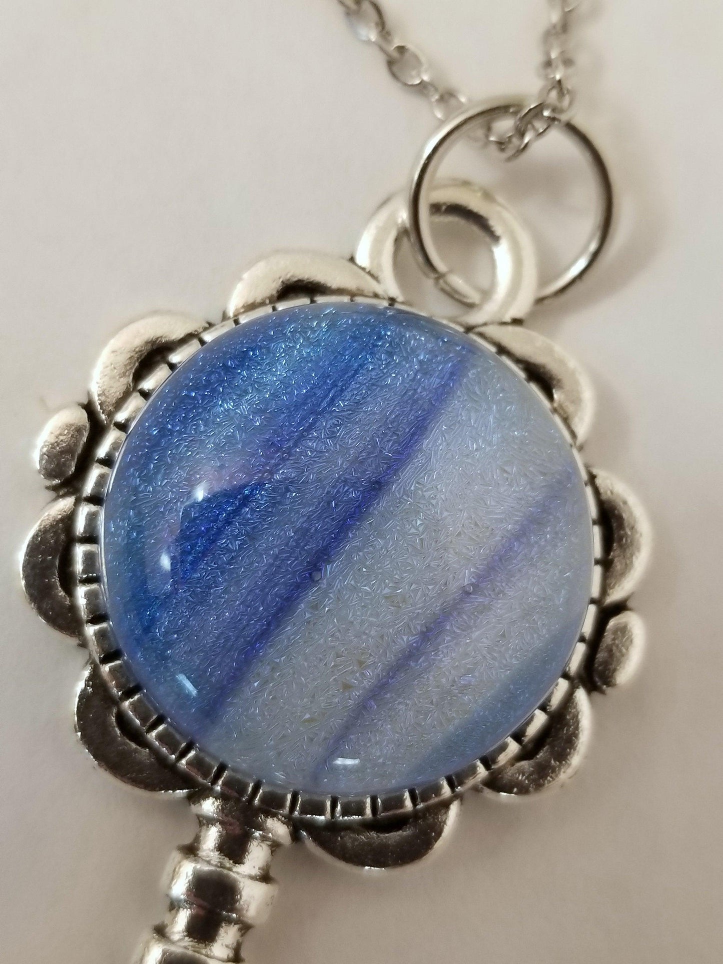 Silver finish Flowered Skeleton Key with Fused Glass Blue Stripe Dichroic cabochon on 24 inch stainless steel chain Seeds Glassworks  seedsglassworks jewelry