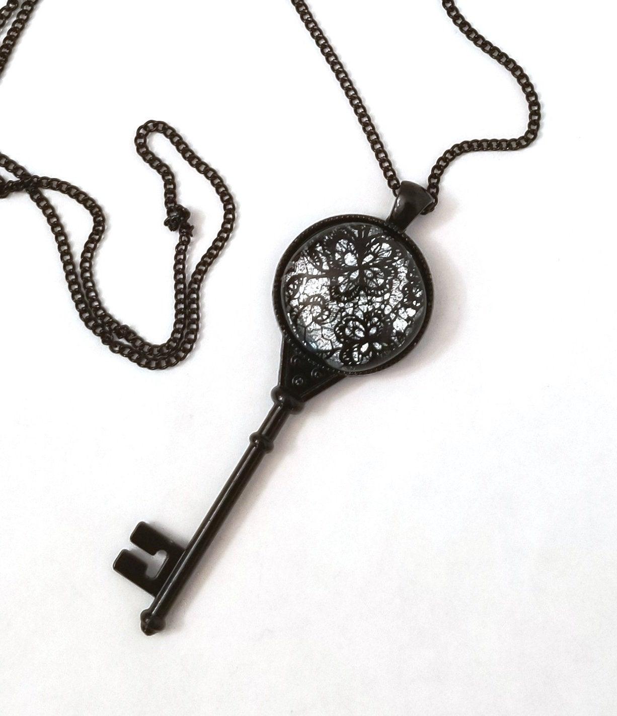 Black Metal Skeleton Key with Fused Glass Silver Lace cabochon on 24 inch black chain Seeds Glassworks seedsglassworks