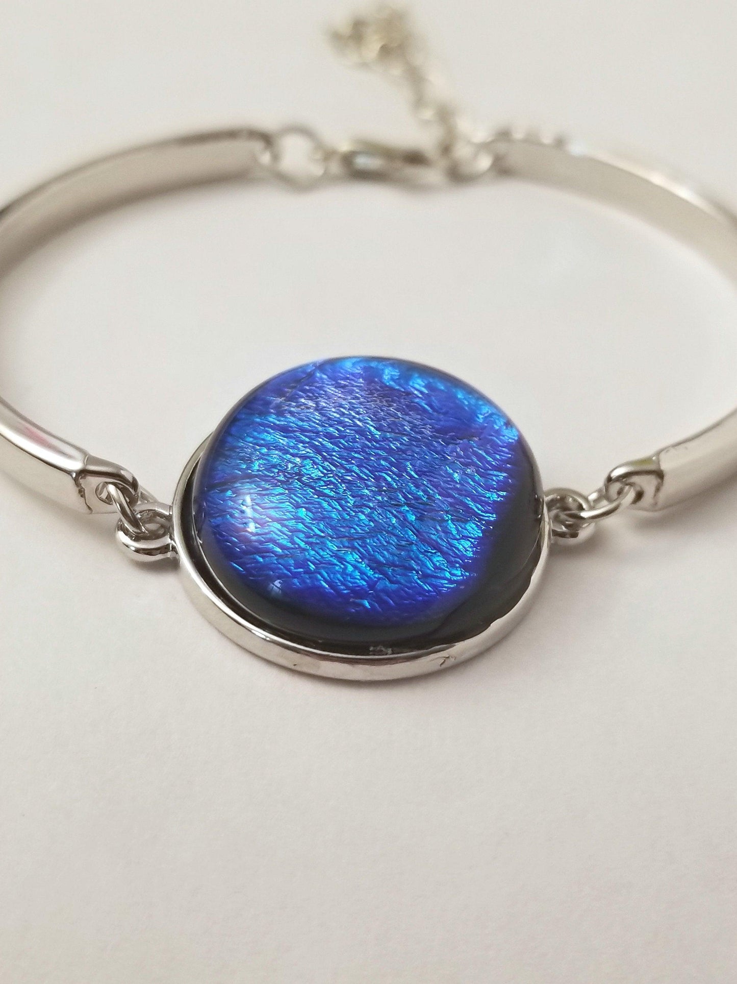 Delicate Adjustable Bracelet,  silver tone with medium Blue Dichroic fused glass cabochon
