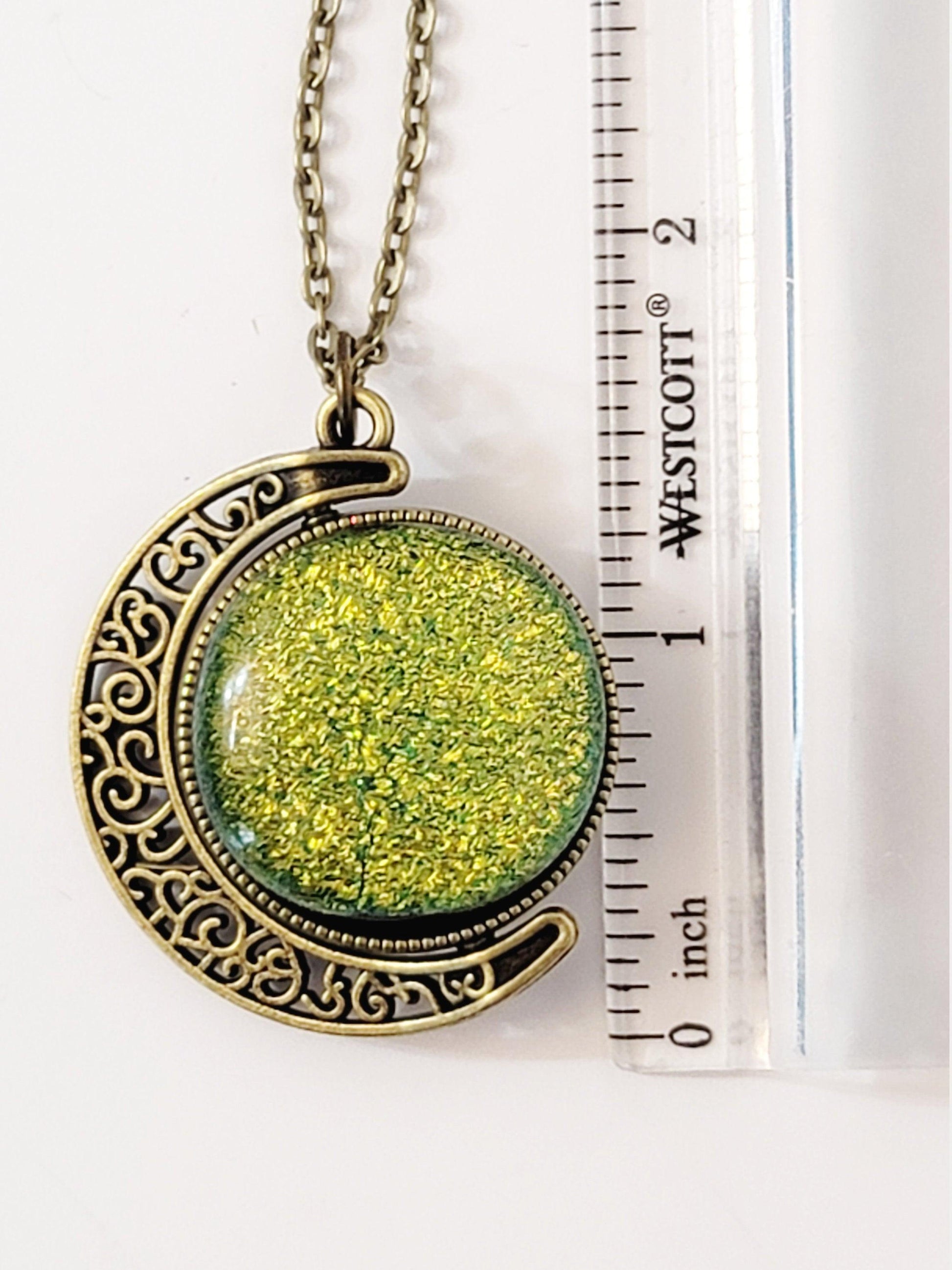 Blue and Green Dichroic Glass double sided Crescent Moon Pendant with Spinner antique bronze look on 20 inch chain. seeds glassworks, fused glass  seedsglassworks