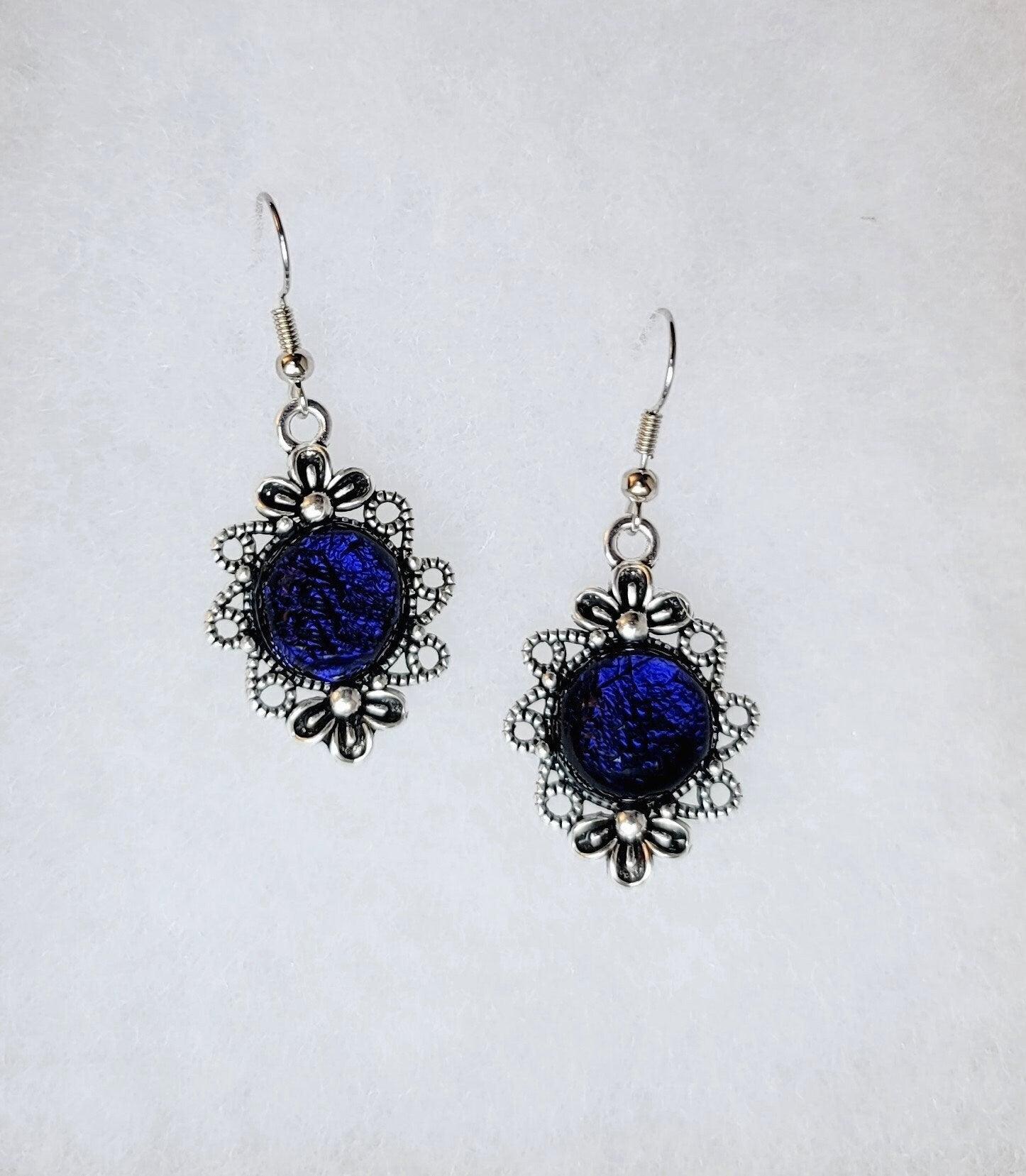 Silver tone flower earrings with dichroic dark blue fused glass cabo pierced style seedsglassworks seeds glassworks