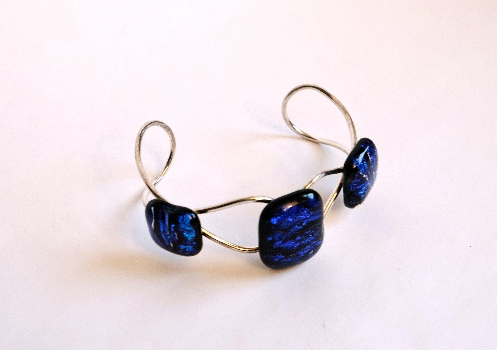 Adjustable cuff Bracelet, silver tone with 3 Dichroic Blue wave fused glass cabochons seeds glassworks seedsglassworks