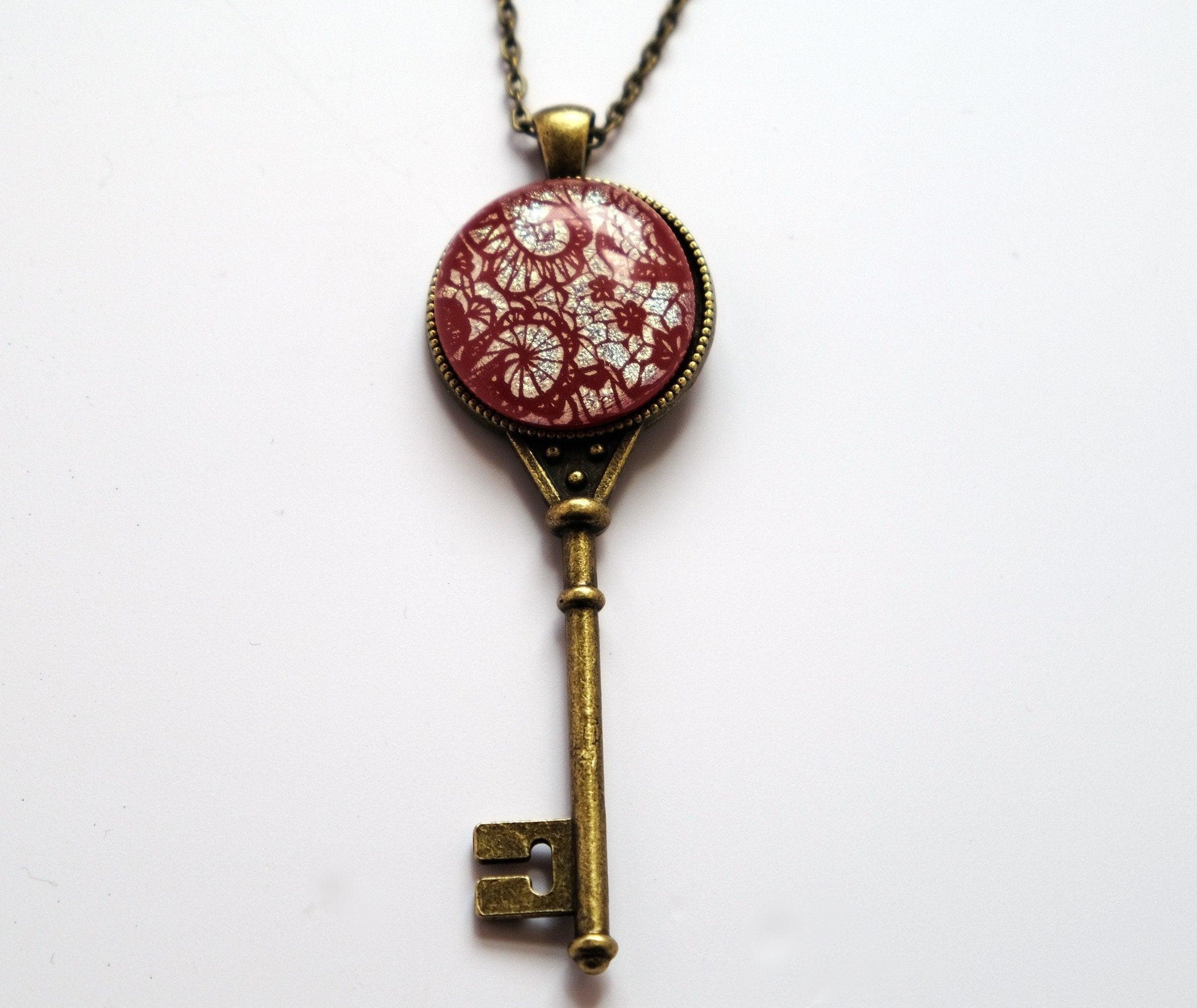 Antiqued Brass Skeleton Key pendant necklace with Fused Glass red lace Dichroic cabochon on 24 inch brass plated chain jewelry  steam punk and Victorian style seeds glassworks seedsglassworks