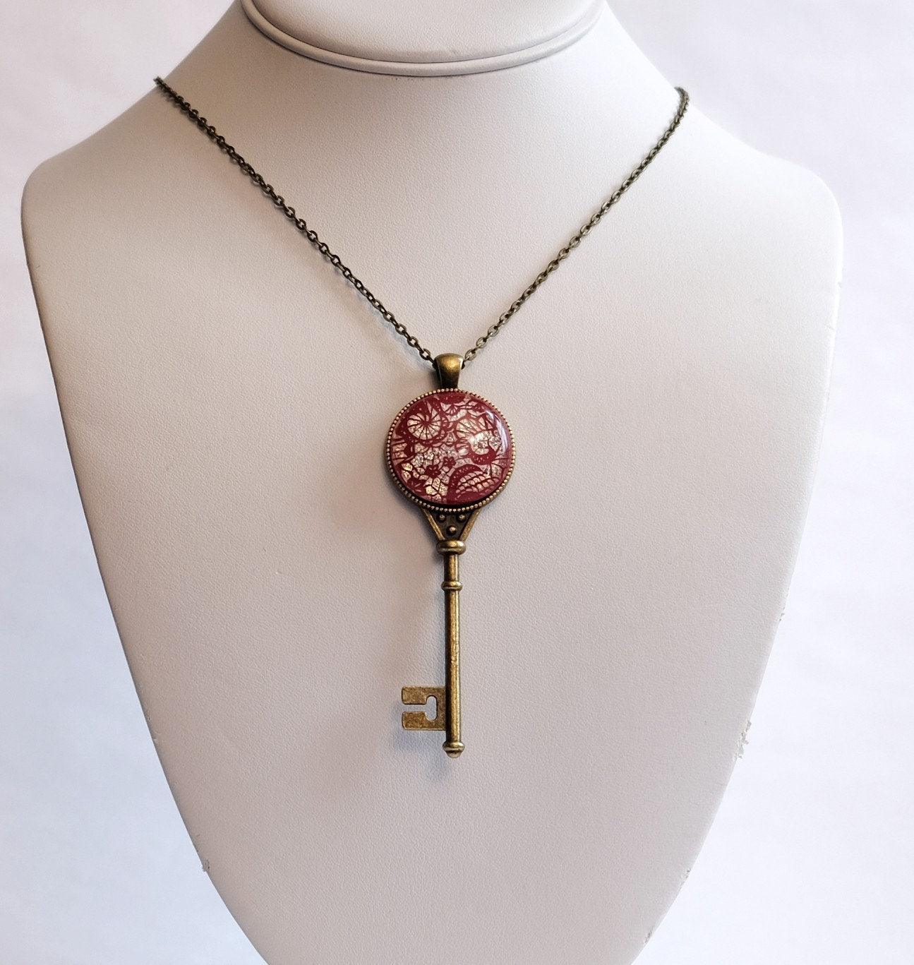Antiqued Brass Skeleton Key pendant necklace with Fused Glass red lace Dichroic cabochon on 24 inch brass plated chain jewelry  steam punk and Victorian style seeds glassworks seedsglassworks