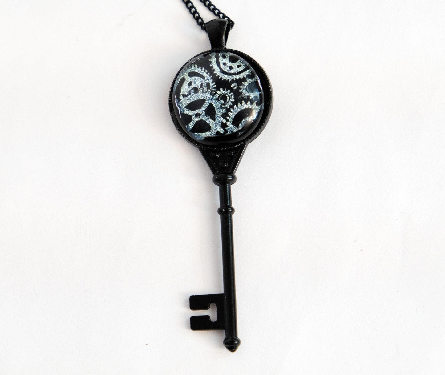 Steampunk Black Metal Skeleton Key pendant necklace with Fused Glass Silver Gears cabochon on 24 inch black chain jewelry seeds glassworks seedsglassworks
