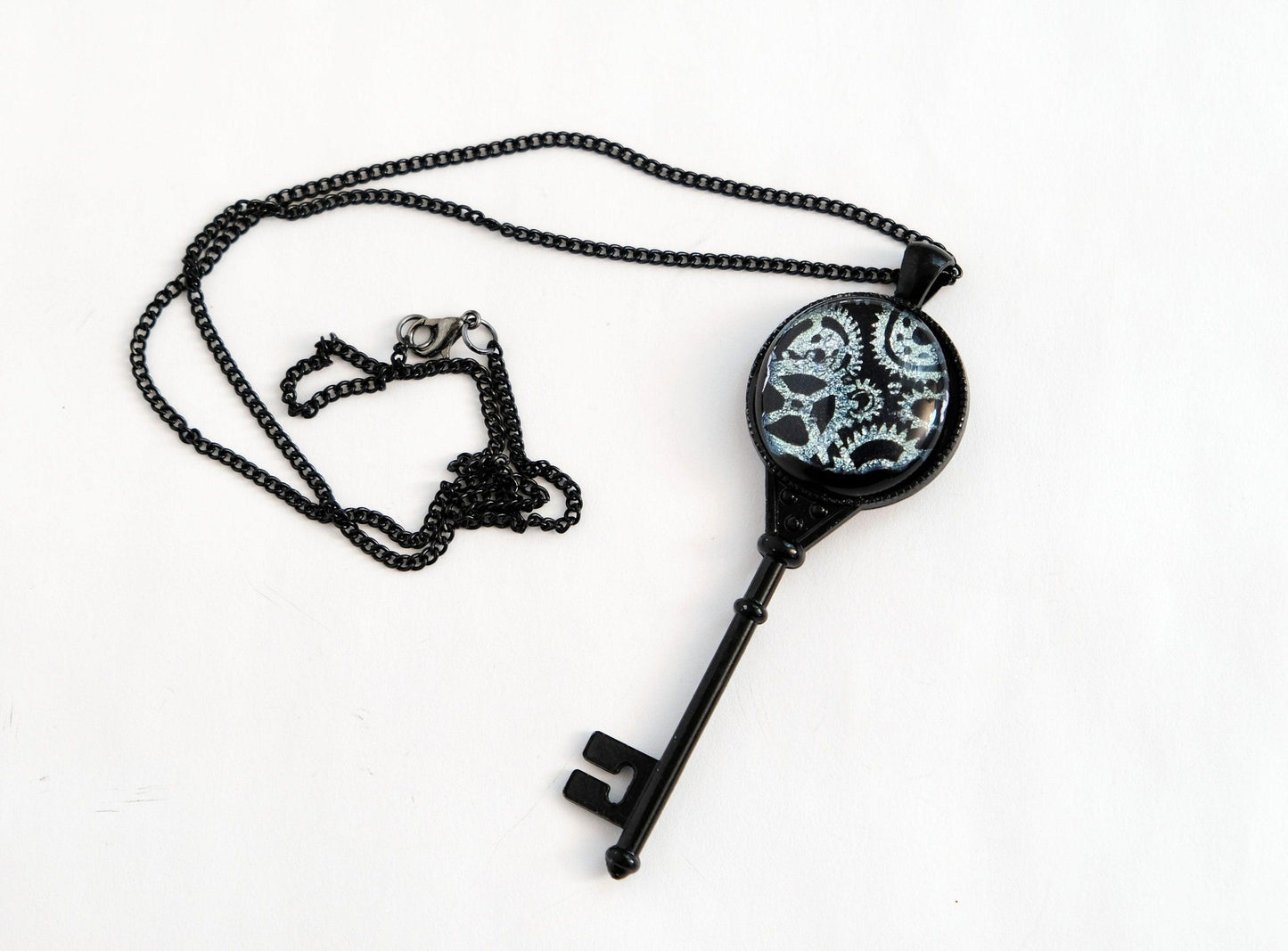 Steampunk Black Metal Skeleton Key pendant necklace with Fused Glass Silver Gears cabochon on 24 inch black chain jewelry seeds glassworks seedsglassworks